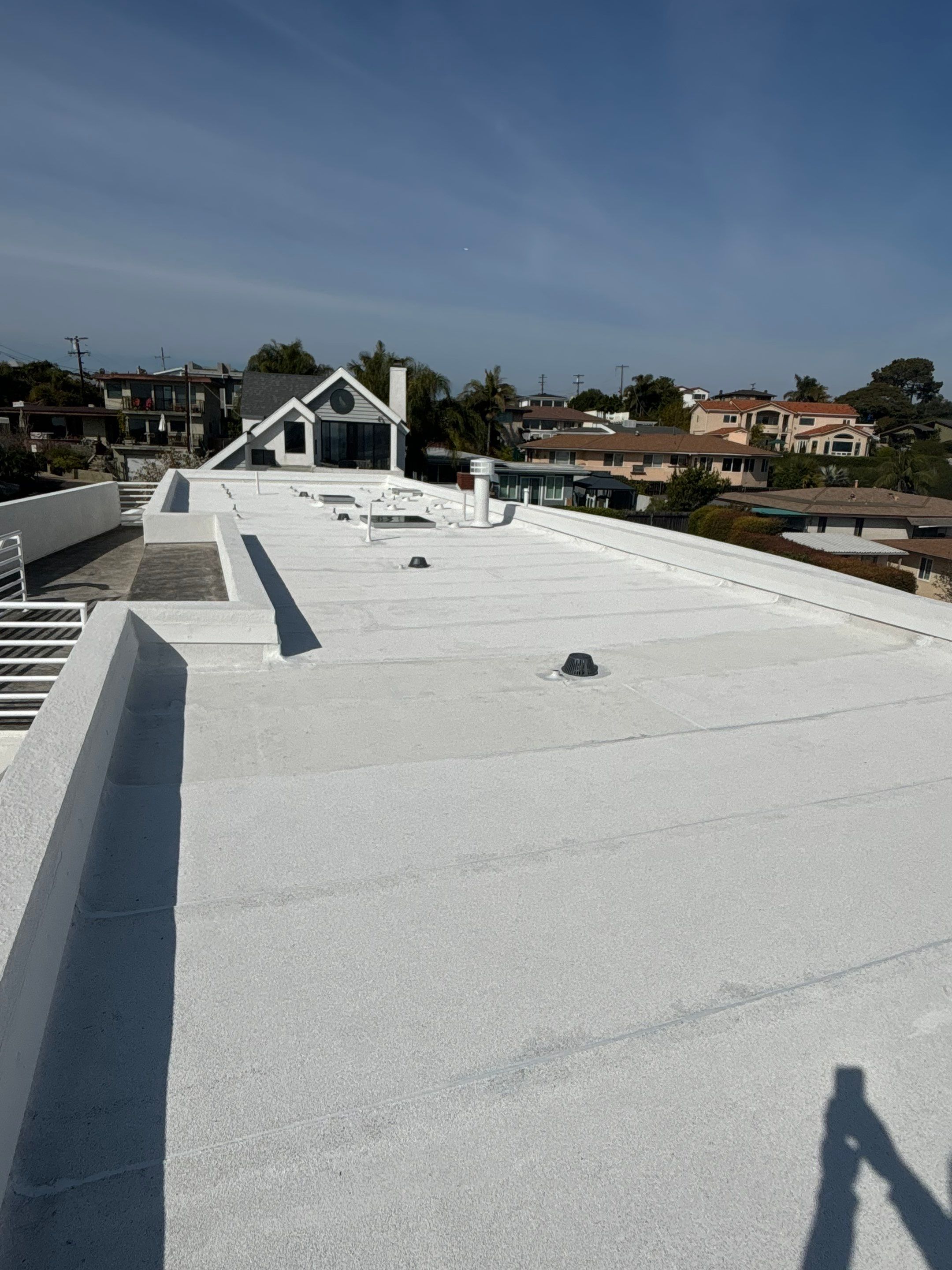 Point Loma Flat Roof Replacement – Johns Manville Bright White Torch-Applied Roofing System by Zenith Roofing Services 