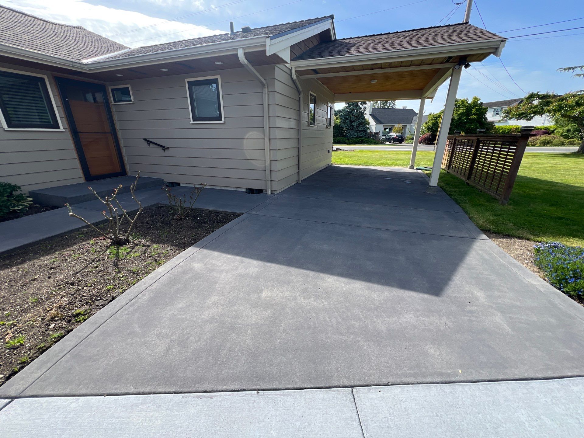 Colored Concrete Driveway Repair with Sealer| Everett    by Jireh Asphalt & Concrete Inc 