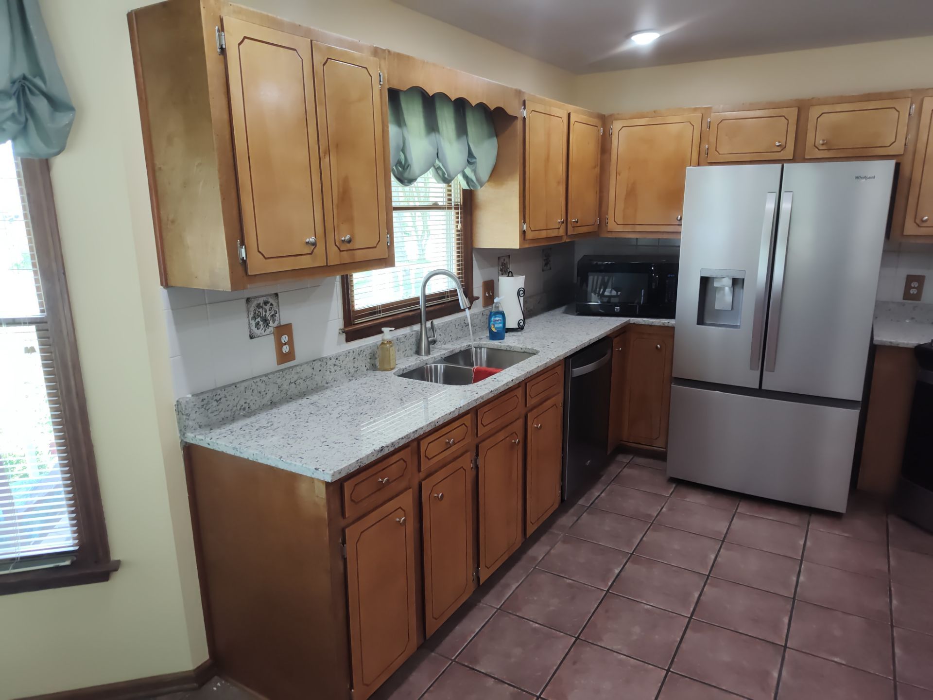 Remodel Kitchen refinishing cabinets by Cornerstone Home Builders, LLC