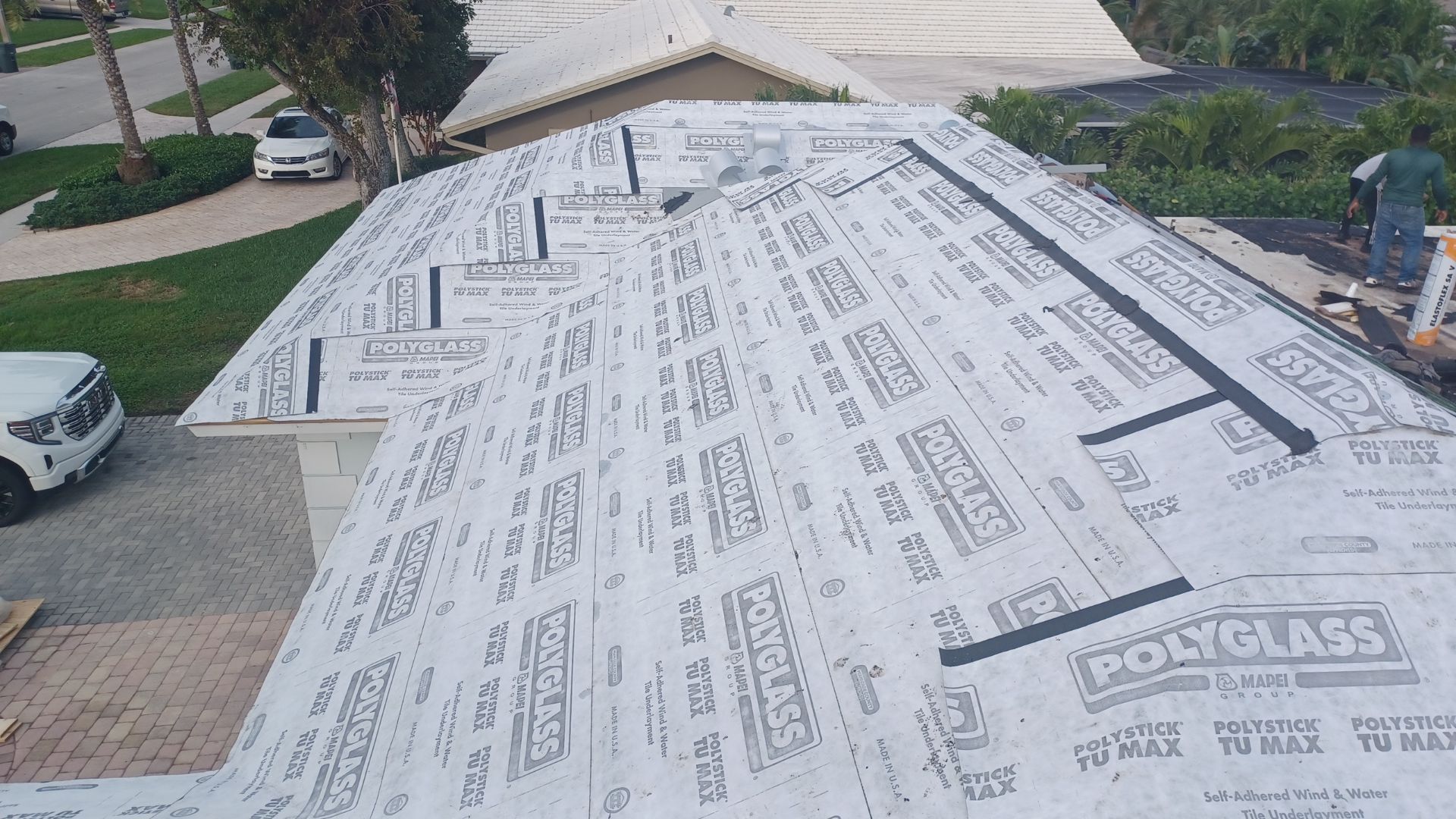 Residential Roofing Installation using 1" Nail strip metal roof by BLUES BROTHERS ROOFING