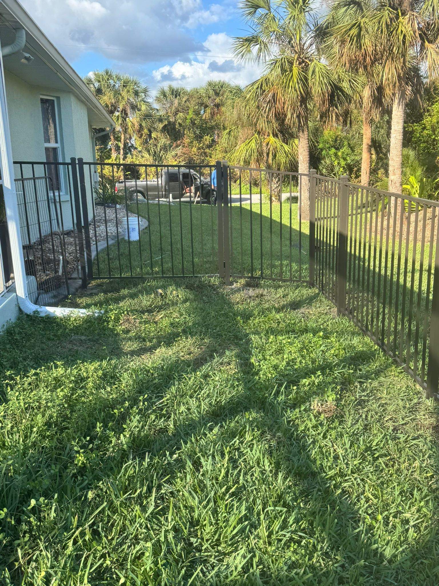 Bronze Aluminum Picket Fence Installation in Port Charlotte by True Fence LLC