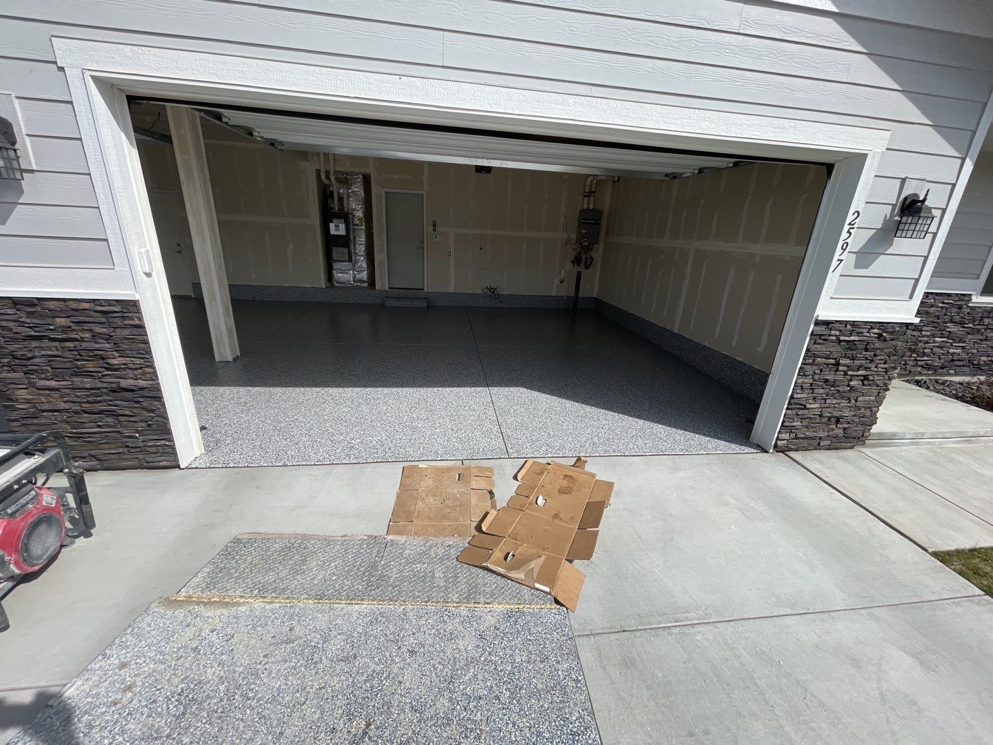 Garage Transformation using Domino by Croc Coatings, LLC