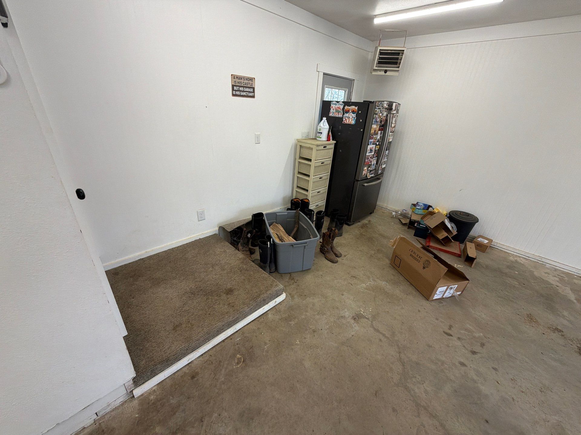 Feather Grey Garage Floor Coating and Crack Repair in Beresford by Select Painting, Coatings & Garage Cabinets