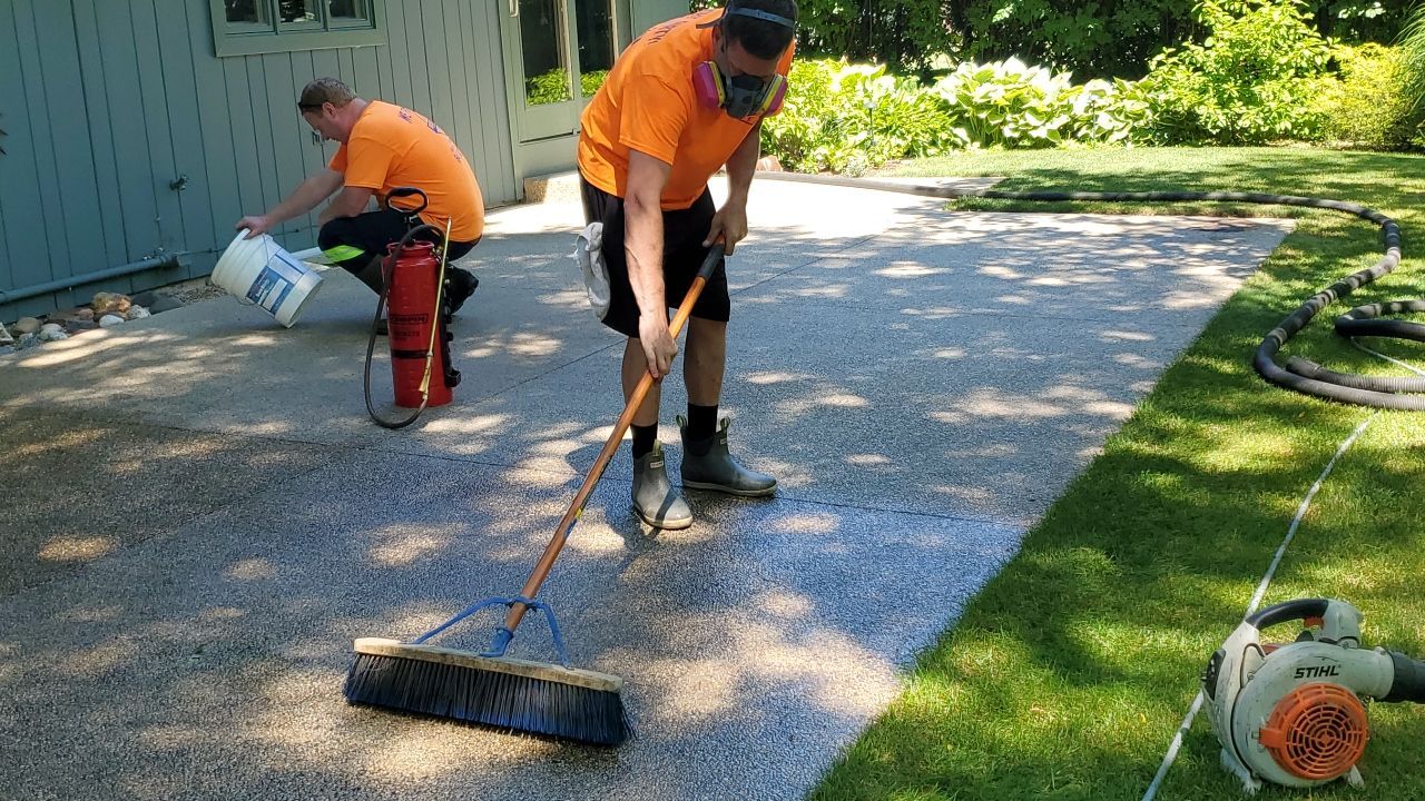 Aggregate concrete cleaning and sealing using Surebond SB-9000 by Northern Power Washing LLC.