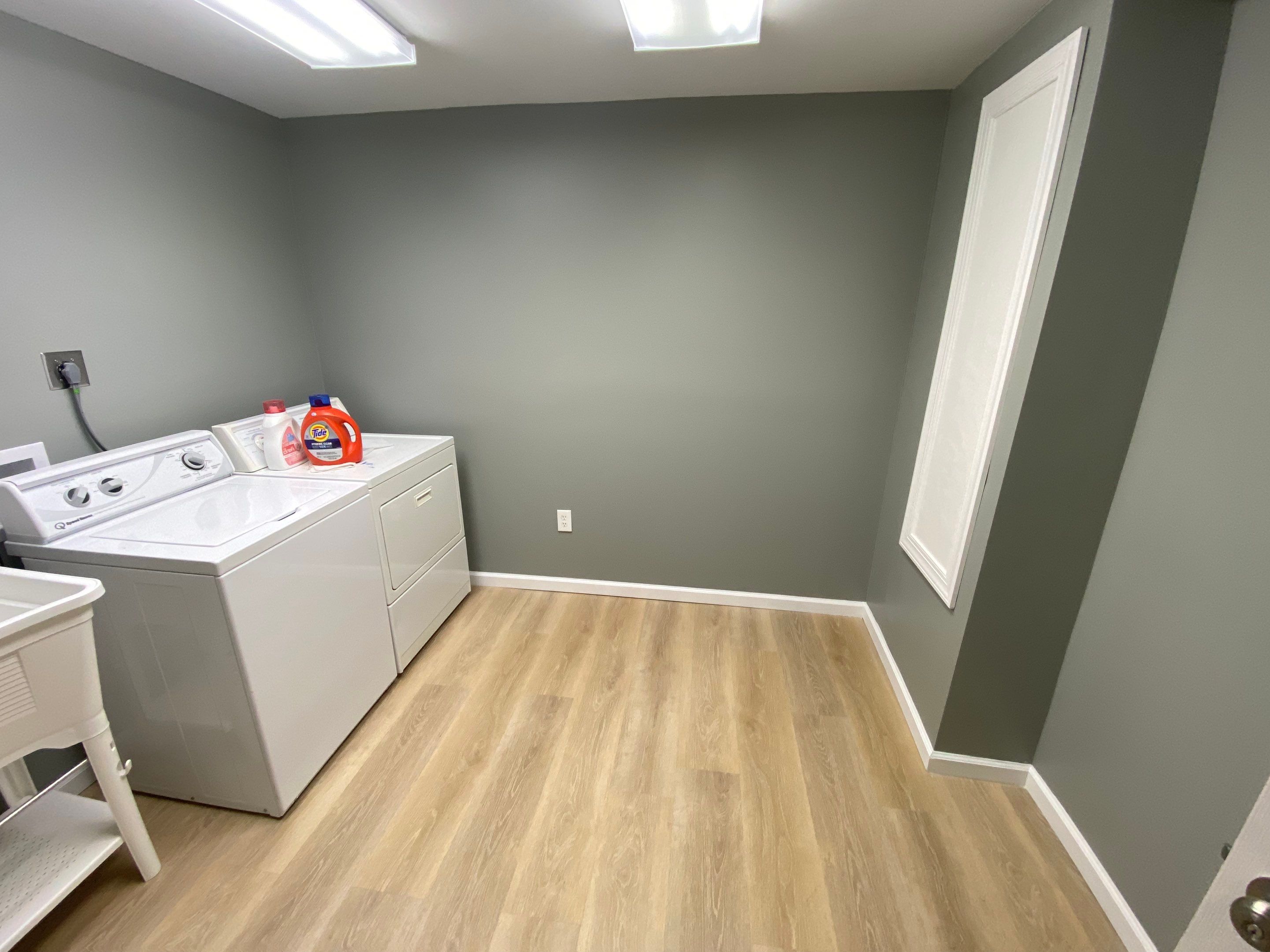 Laundry Room Redmodel using Lifeproof Luxury Vinyl Plank Flooring by The Smet Companies, LLC