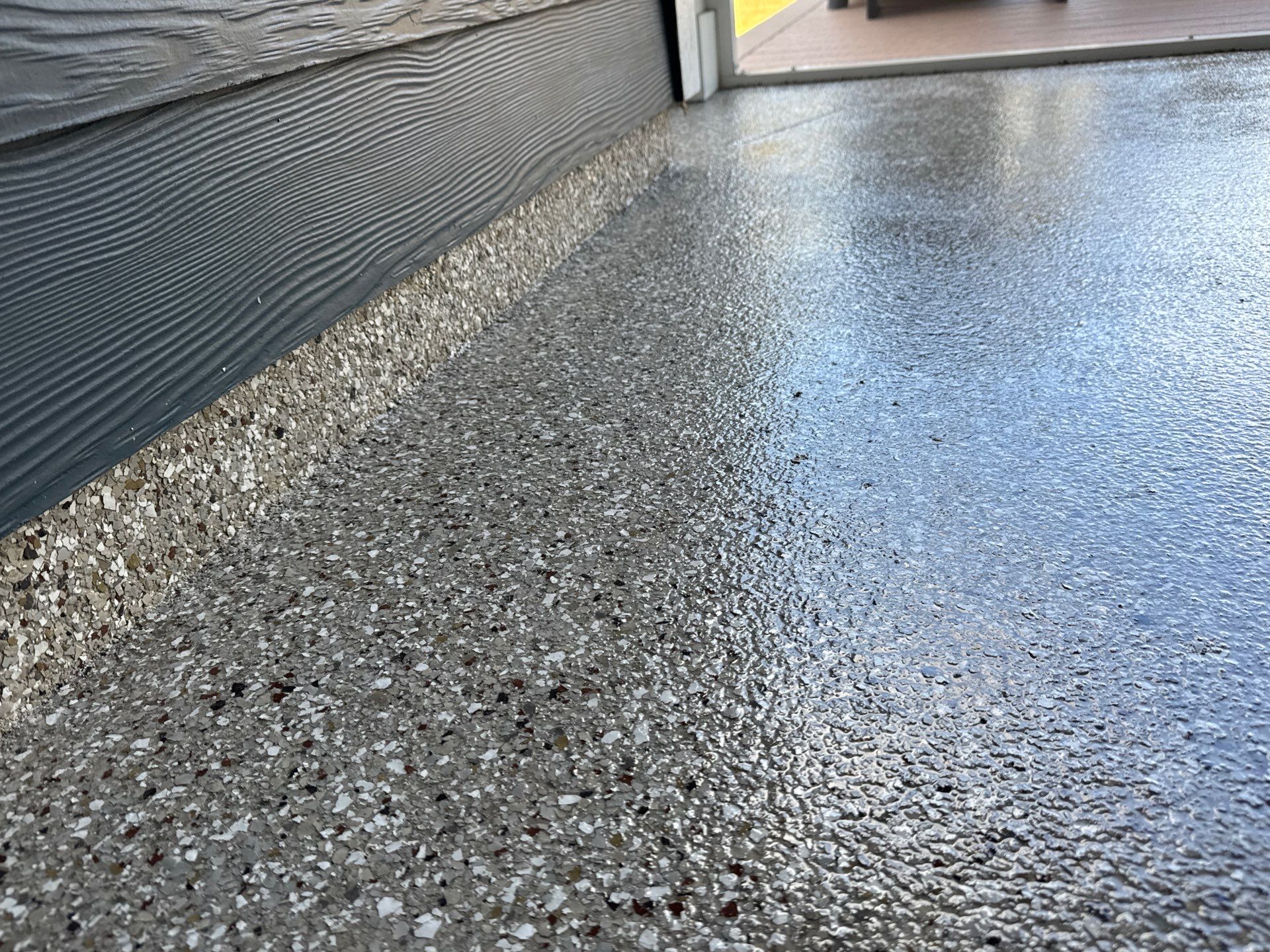 Front and Back Porches in Chiefland, FL in Pebble Beach by Cross Creek Concrete Coatings