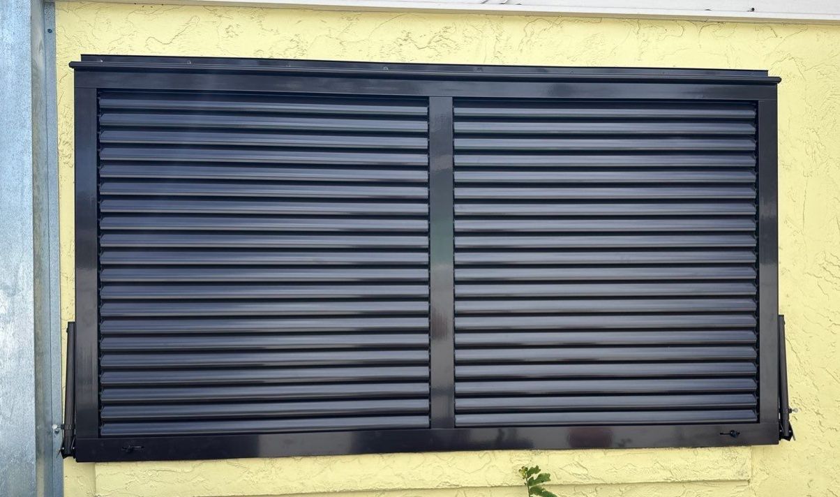 Hurricane Rated Bahama Shutters in Grey Brown by Smart Guard Shutters
