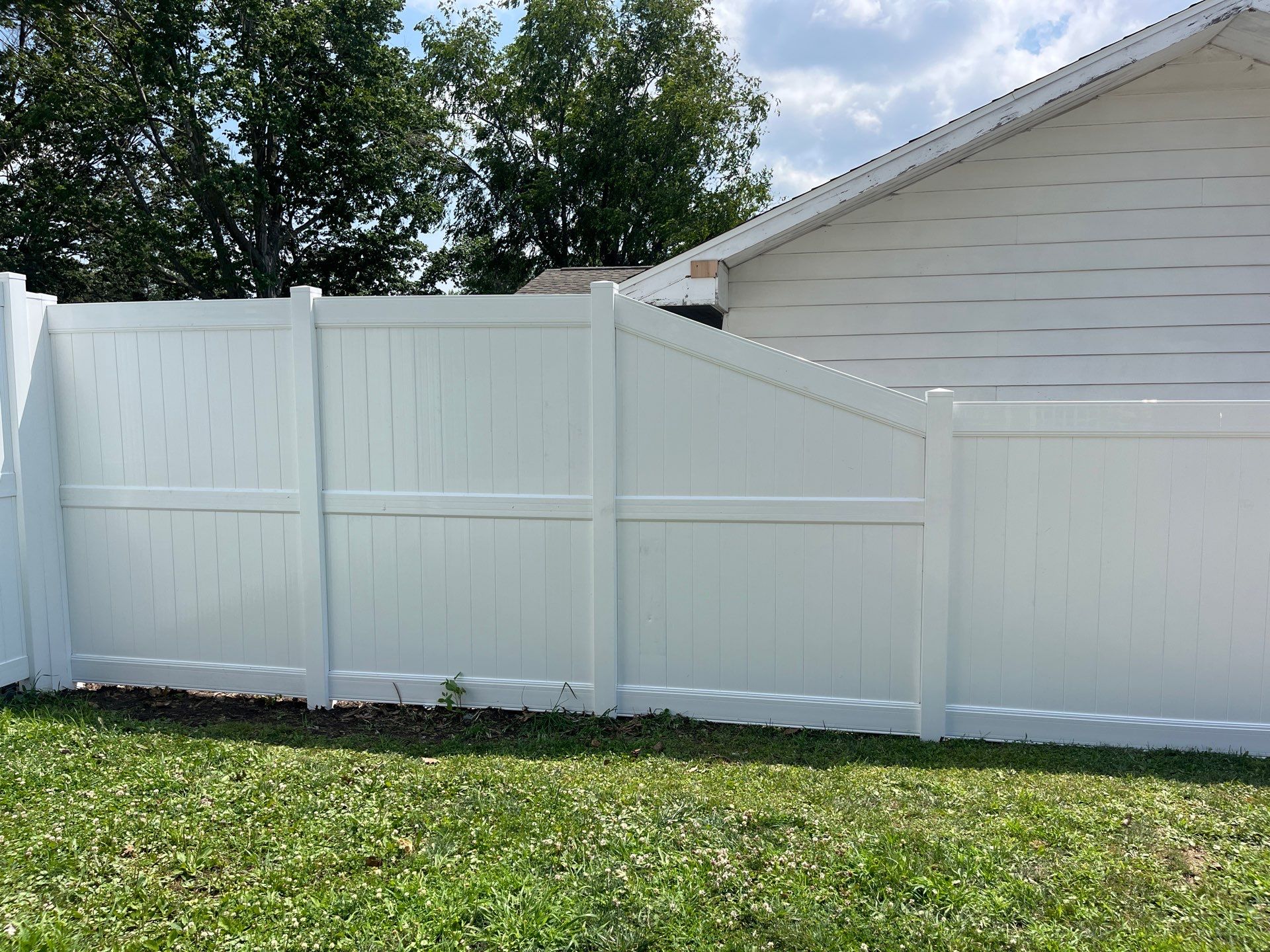 White Vinyl Privacy Fence Installation in Cedar Falls by Perfect Picket Fence and Stain