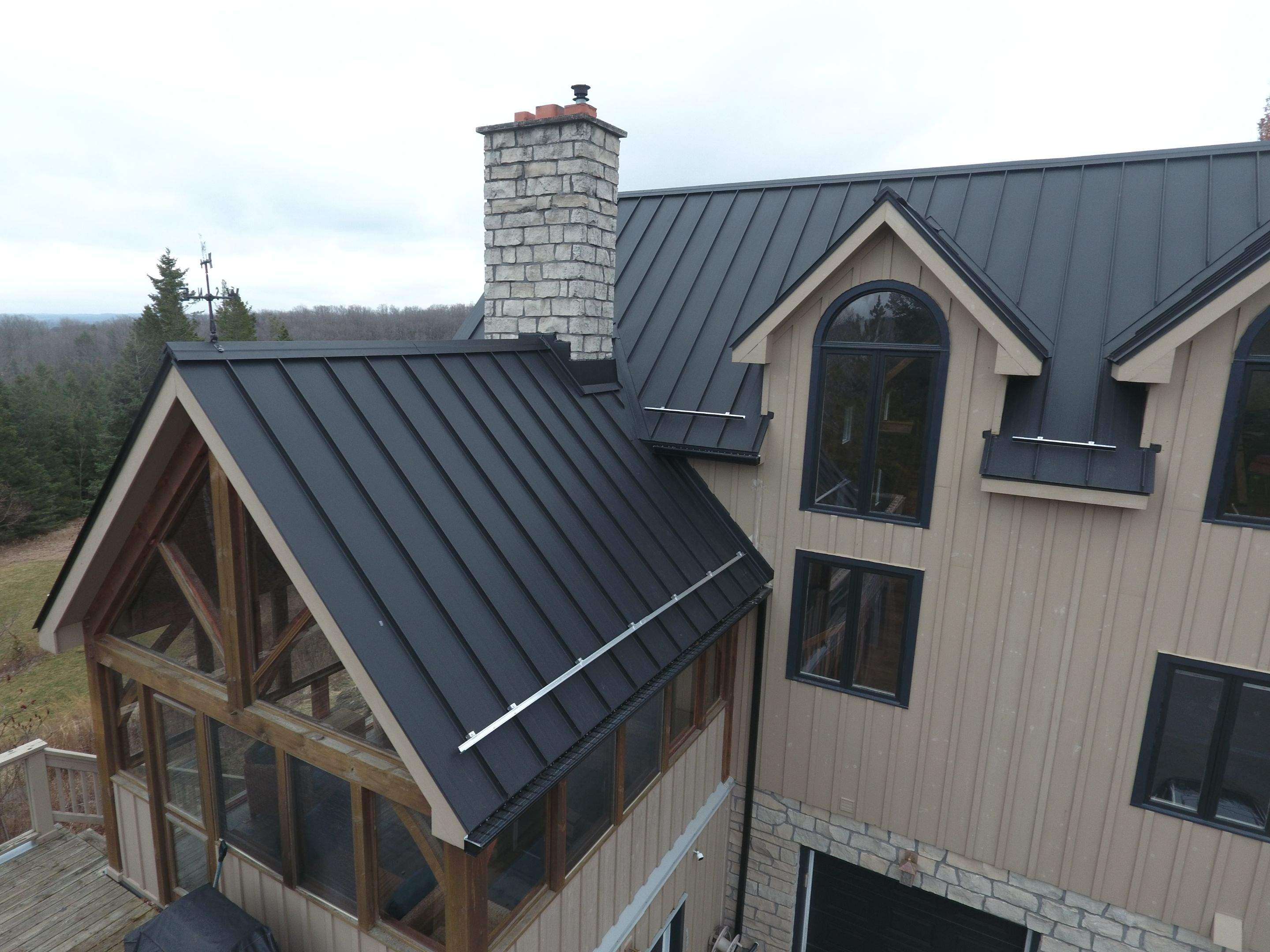 Residential Roofing Installation using 24 Ga Standing Seam Metal by Jay Carter Roofing & Sheet Metal