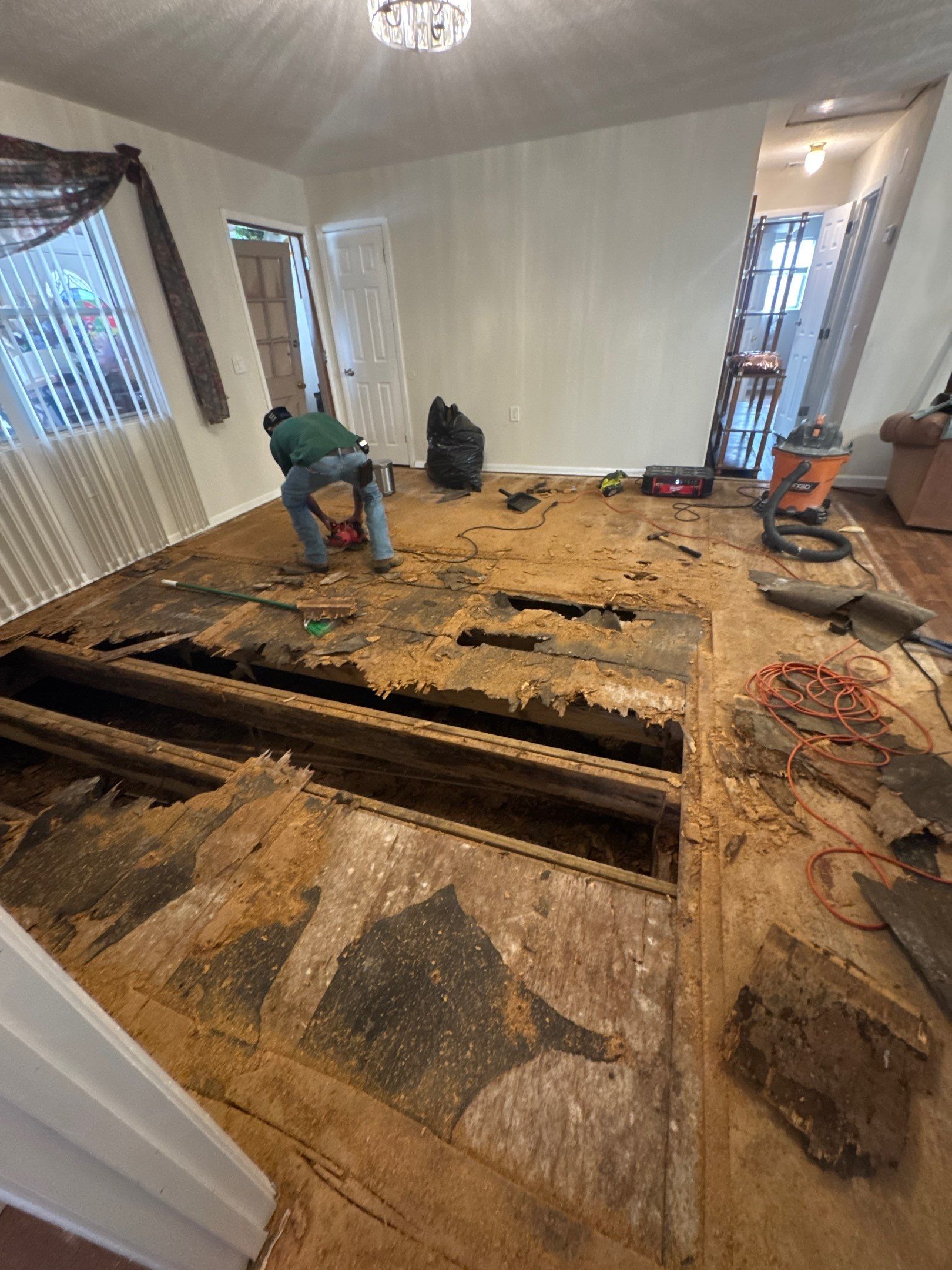 Subfloor Repairs & Flooring Installation by Axtra Hand
