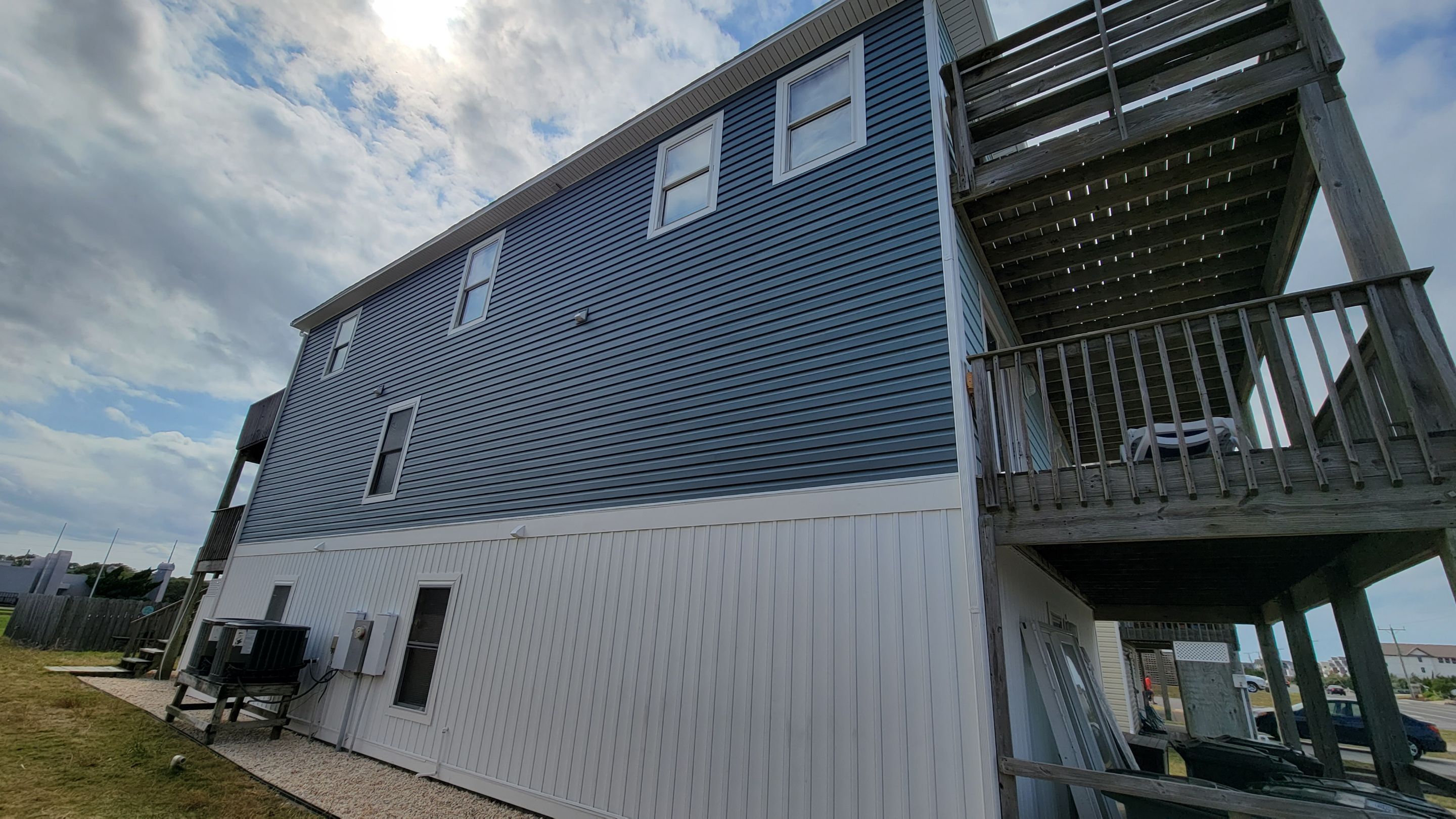 From Bland to Blue by Gallop Roofing & Remodeling, Inc.