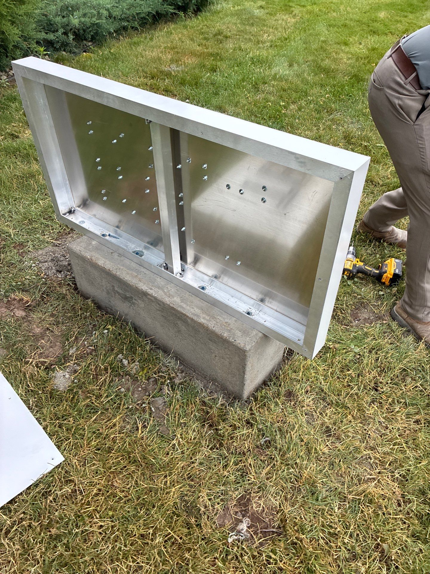 Custom Monument Signage and Concrete Foundation Installation in Granger by Hayes Design co