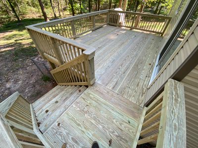 Custom Elevated Pressure-Treated Wood Deck Installation in Raleigh