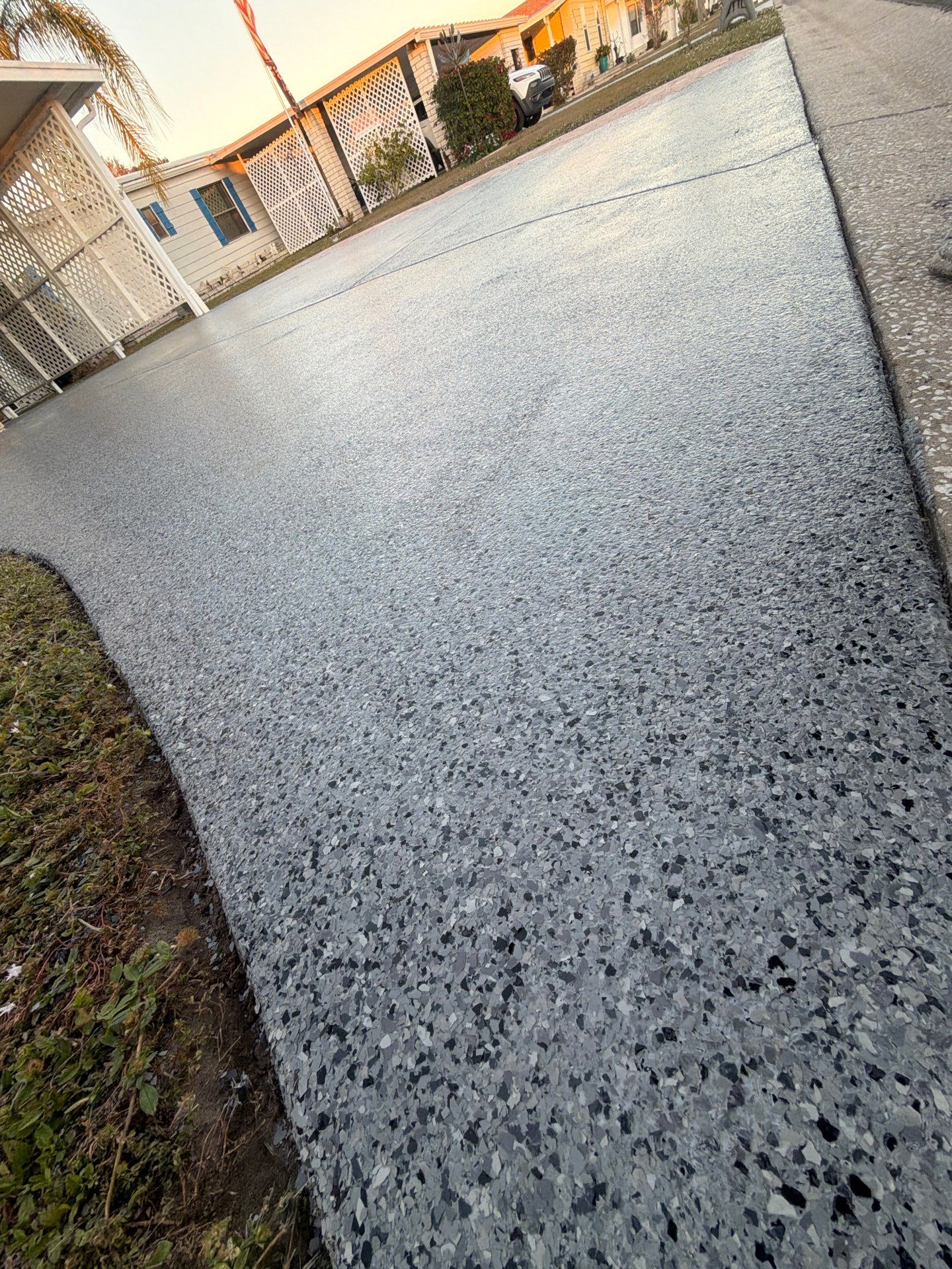 Driveway Transformation: Nightfall Flake System with Full UV & Moisture Protection by Performance Floors & Coating