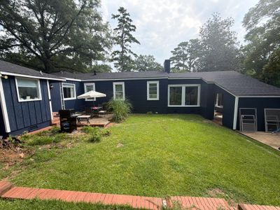 Full Exterior Repaint with Navy Blue and White Trim