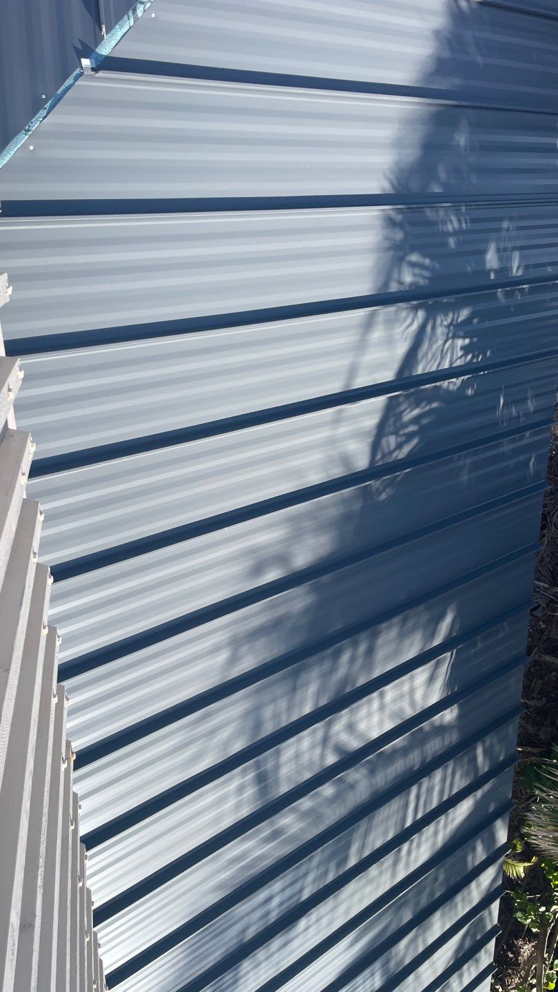 Residential Roofing Installation using Gulf Coast Metals Gulf Seam Panels by Four Peaks Roofing