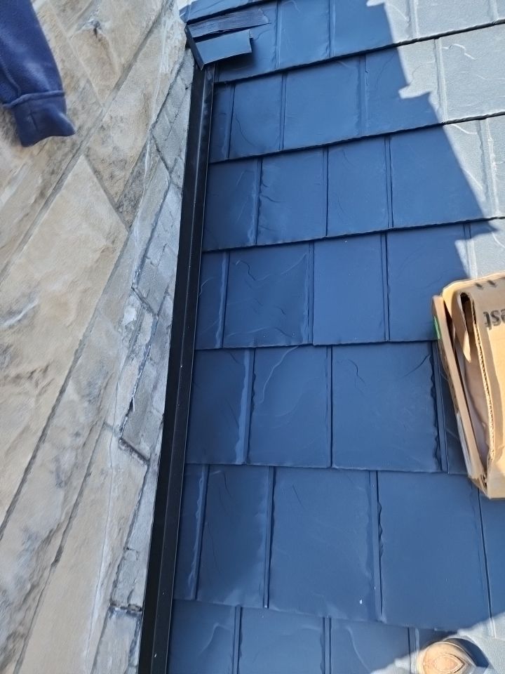 Residential Roofing Installation using Vic West Nothridge Slate by 4Ever Metal Roofing