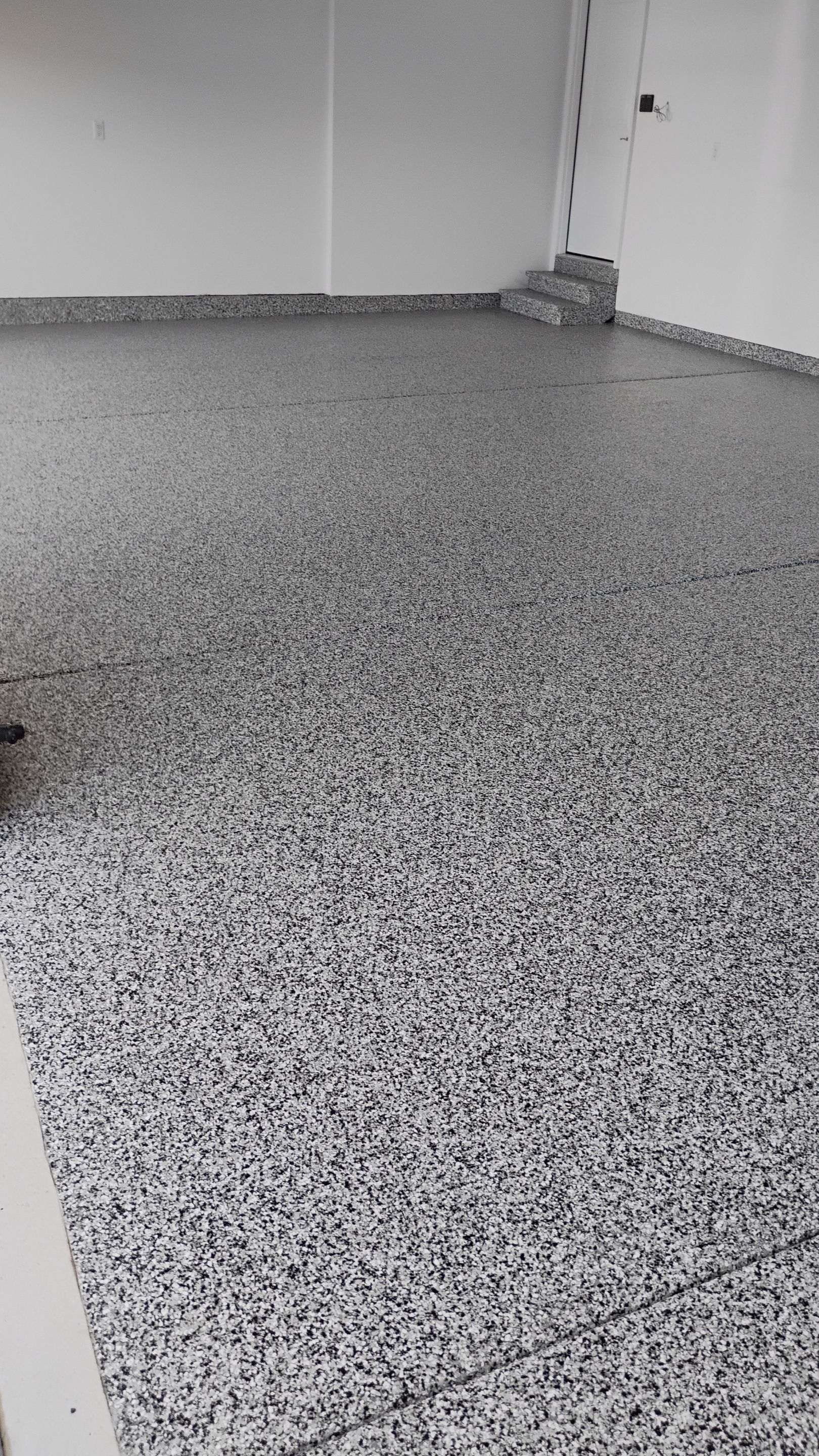 Domino Garage Floor Coating by Level 10 Coatings