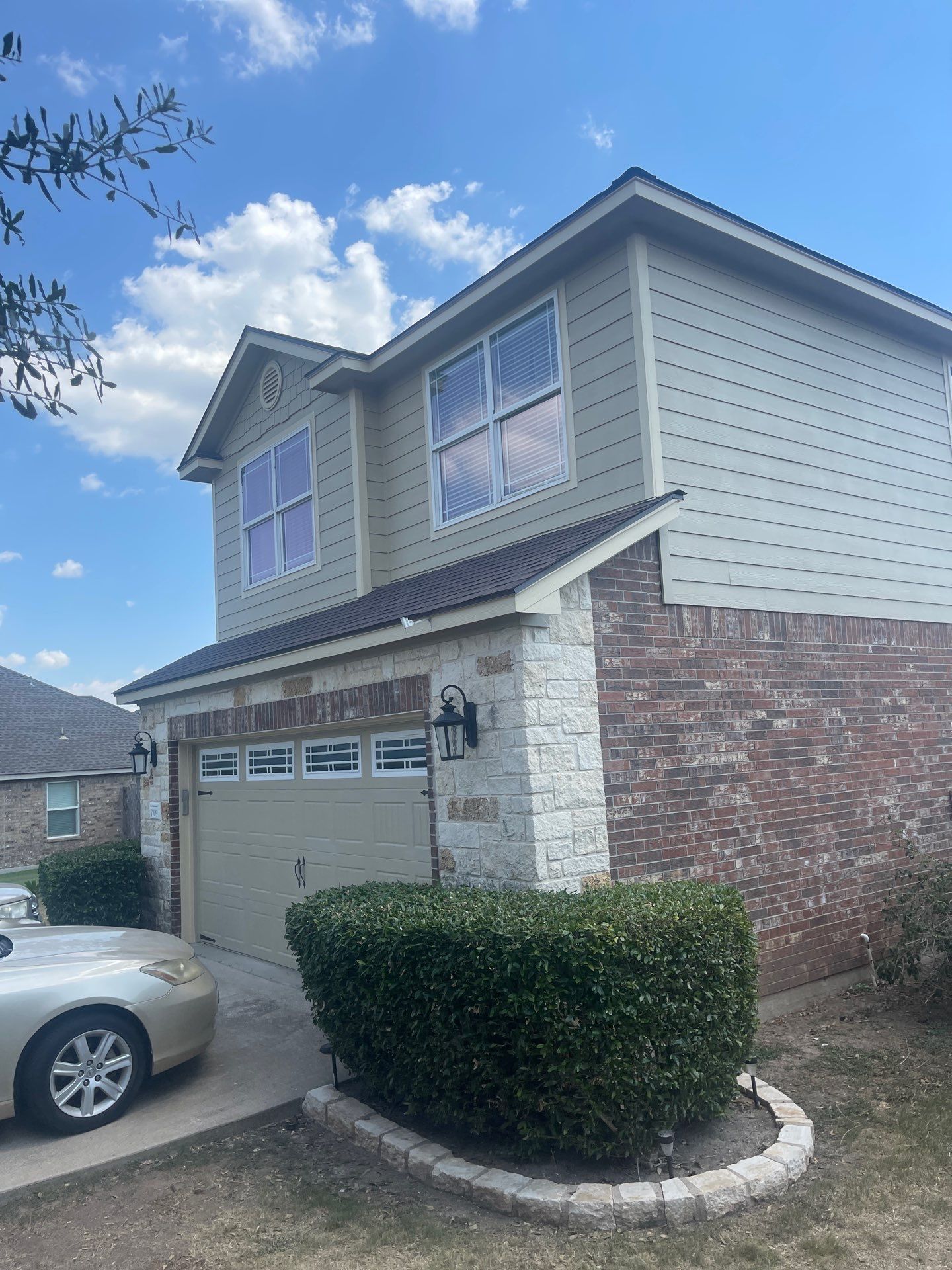 Residential Roofing Installation using Owens Corning Oakridge Brownwood by DeZign Roofing & Exteriors