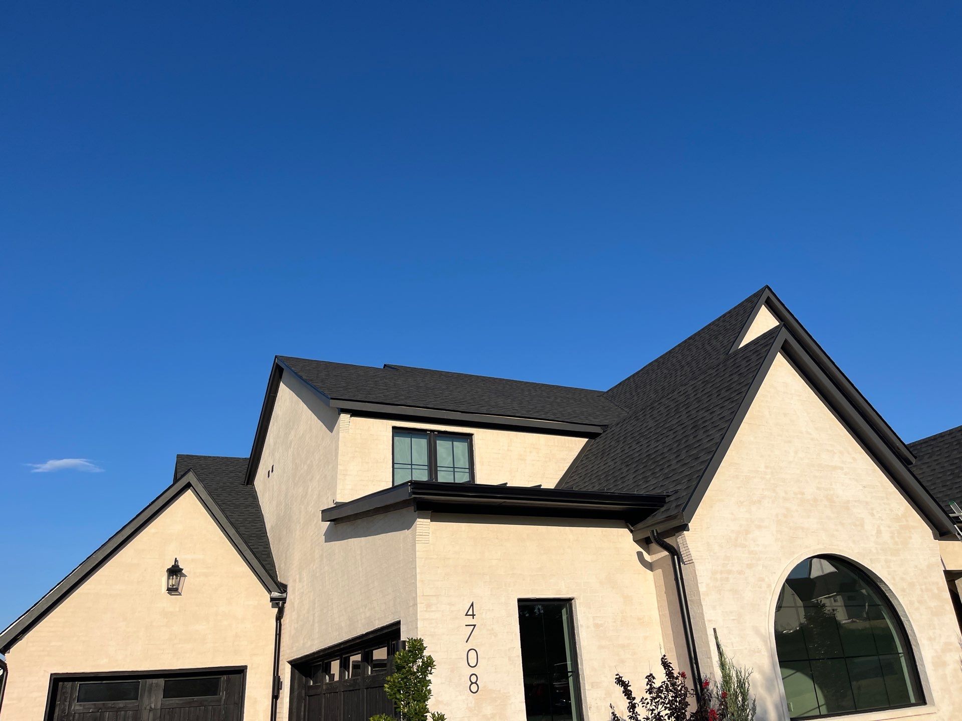 GAF-Charcoal with White Brick  by Tejas Roofworks + Restoration