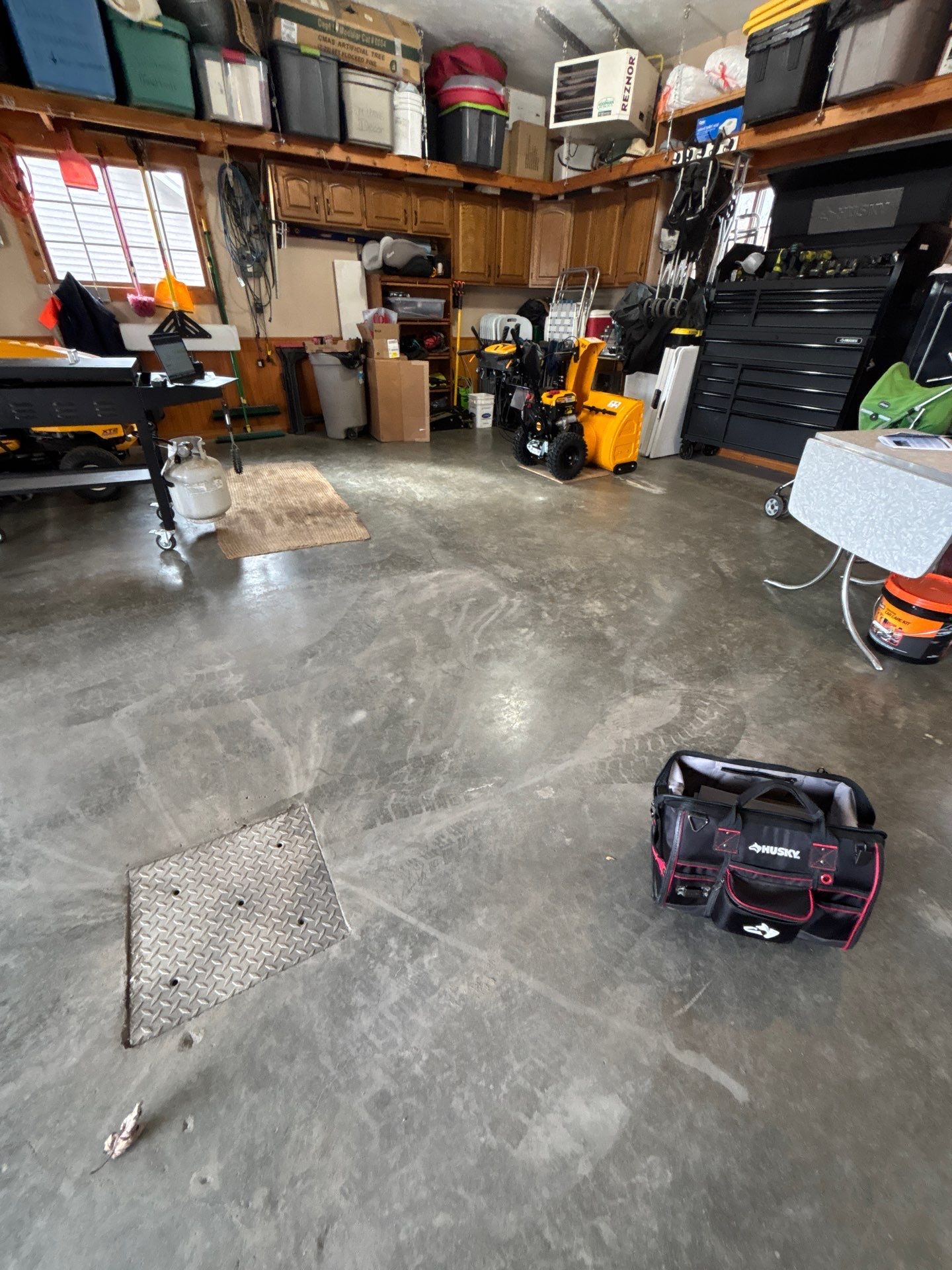 Multi-Fleck Epoxy Garage Floor Coating in Dell Rapids by Select Painting, Coatings & Garage Cabinets