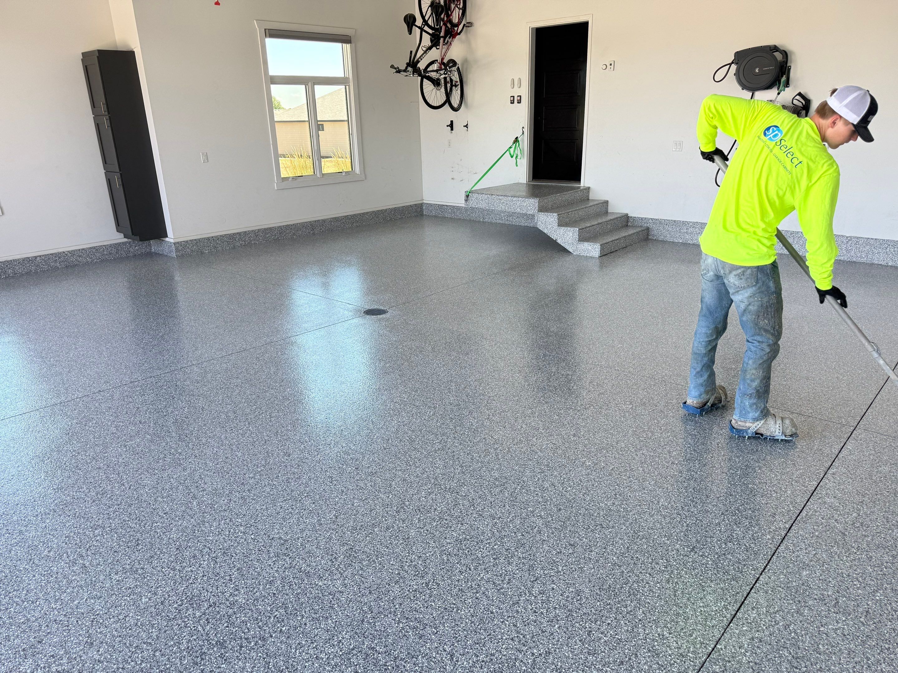 Gravel Flake Garage Floor Coating in Yankton by Select Painting, Coatings & Garage Cabinets