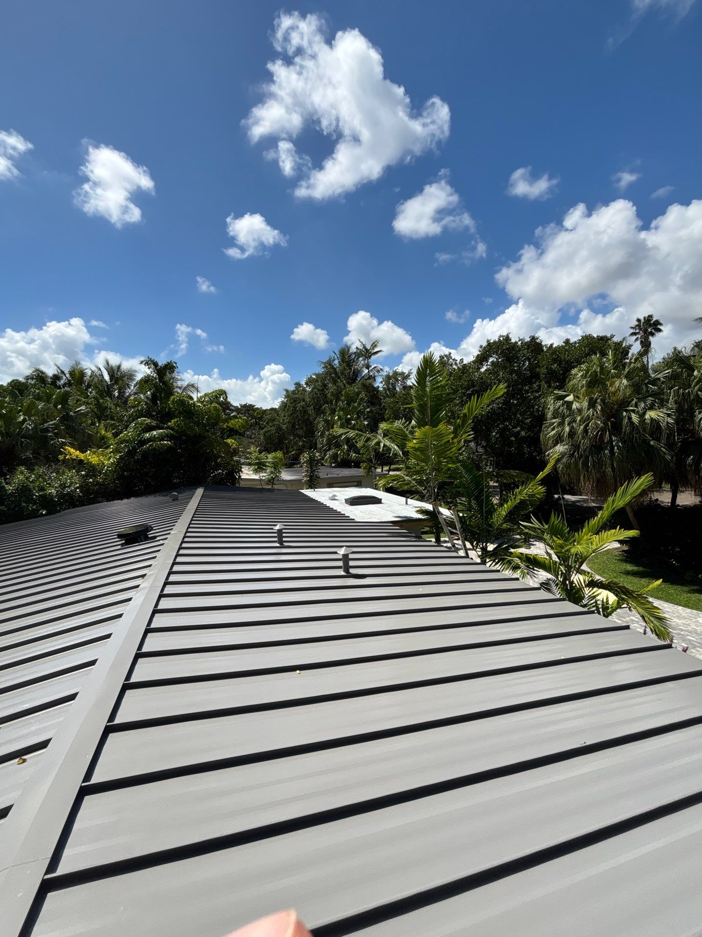 Metal Roof Replacement by Art's Roofing & Construction