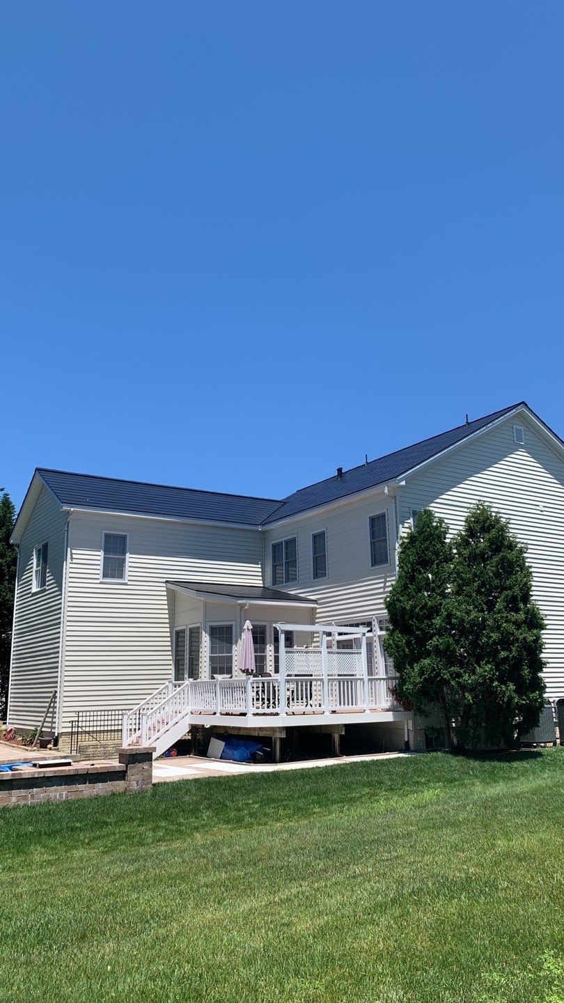 Tesla Solar Roof Replacement using Tesla Solar Roof V3 tiles by American Home Contractors