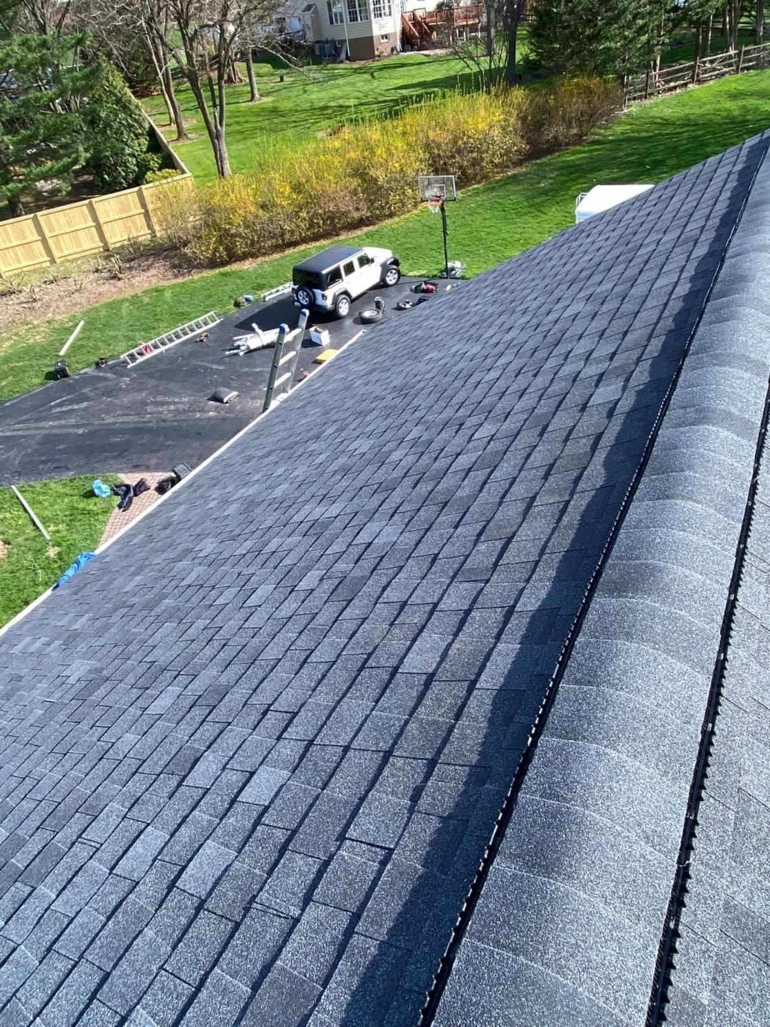 Residential Roofing Installation using Atlas Pinnacle Pristine Black Architectural Shingles by Frederick Roof Repair