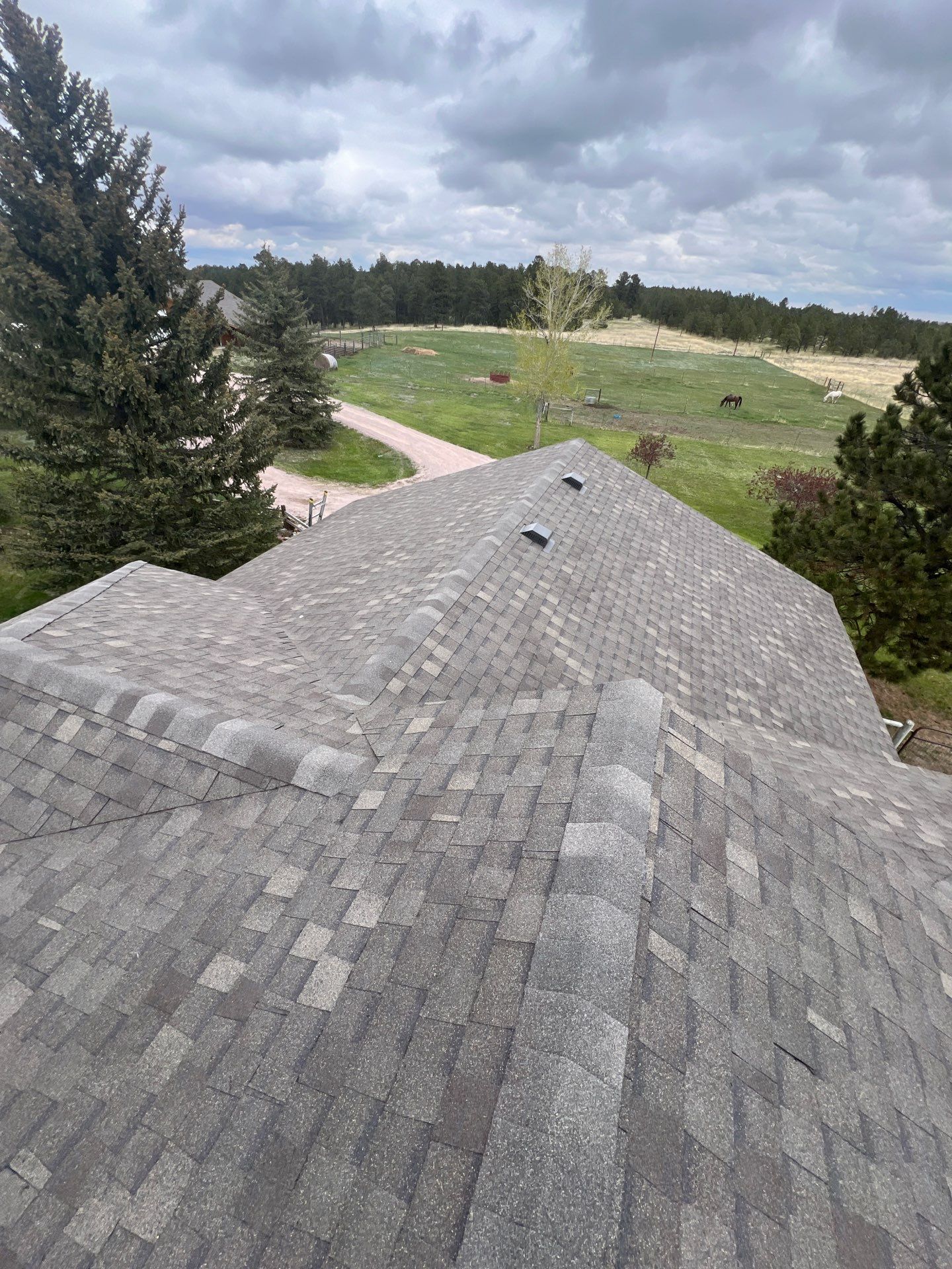Residential Roofing Installation using Atlas Pinnacle Impact Weathered Wood by Blue Peaks Roofing LLC 