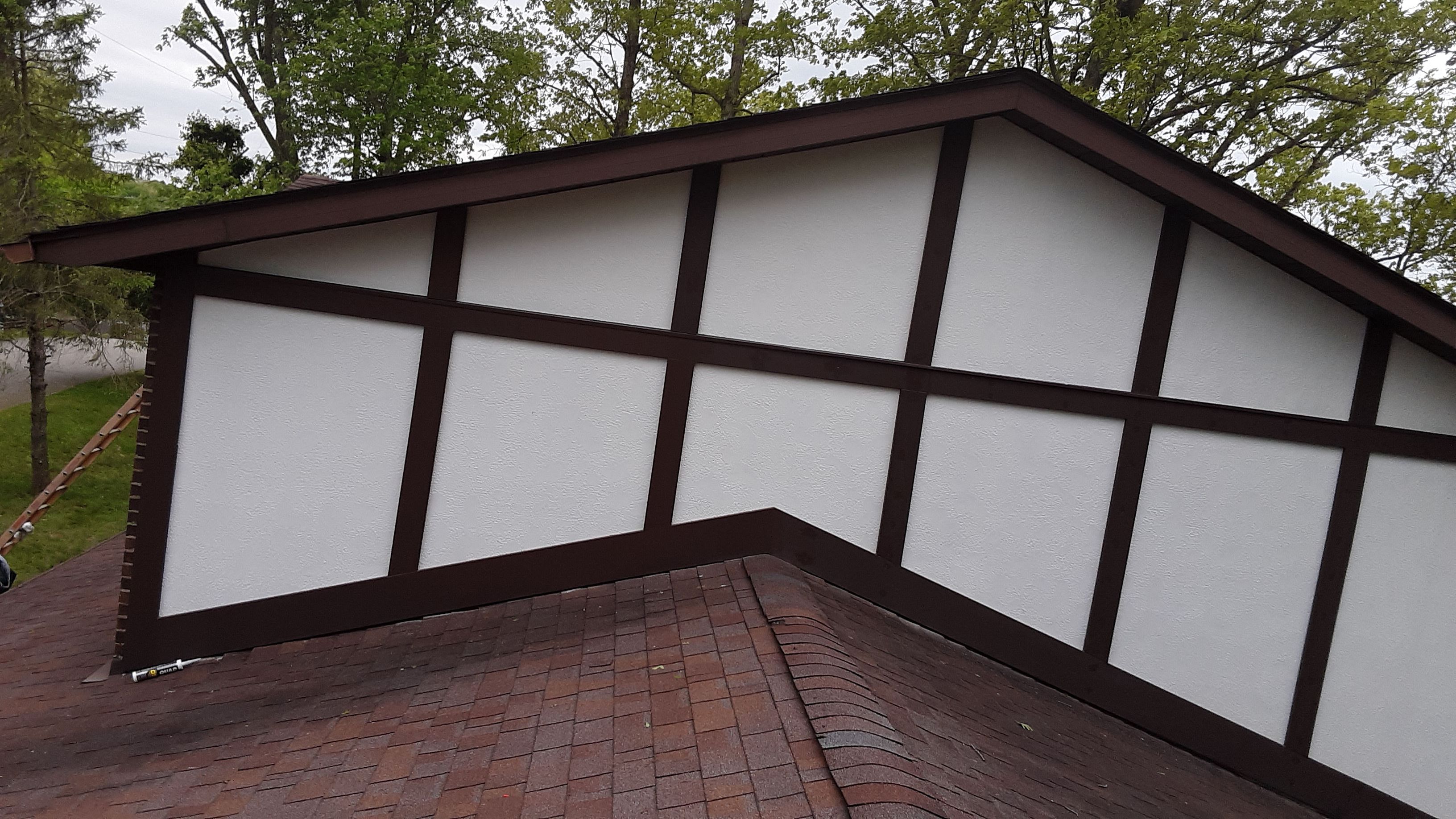Old to New Tudor Style Fiber Cement Update by Secure Construction Company Inc