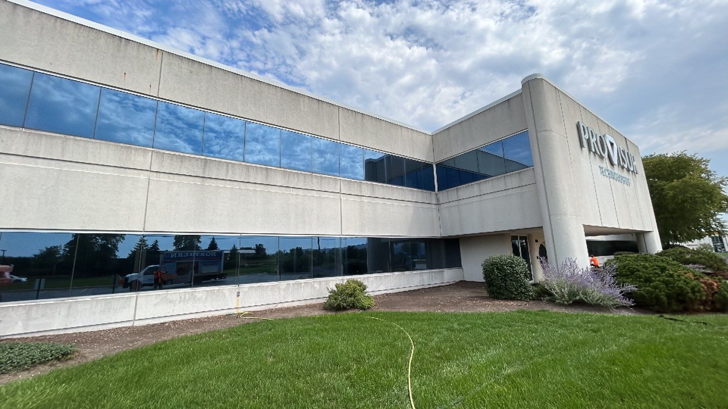 commercial pressure washing using Algaecide, soft wash soap by Northern Power Washing LLC.