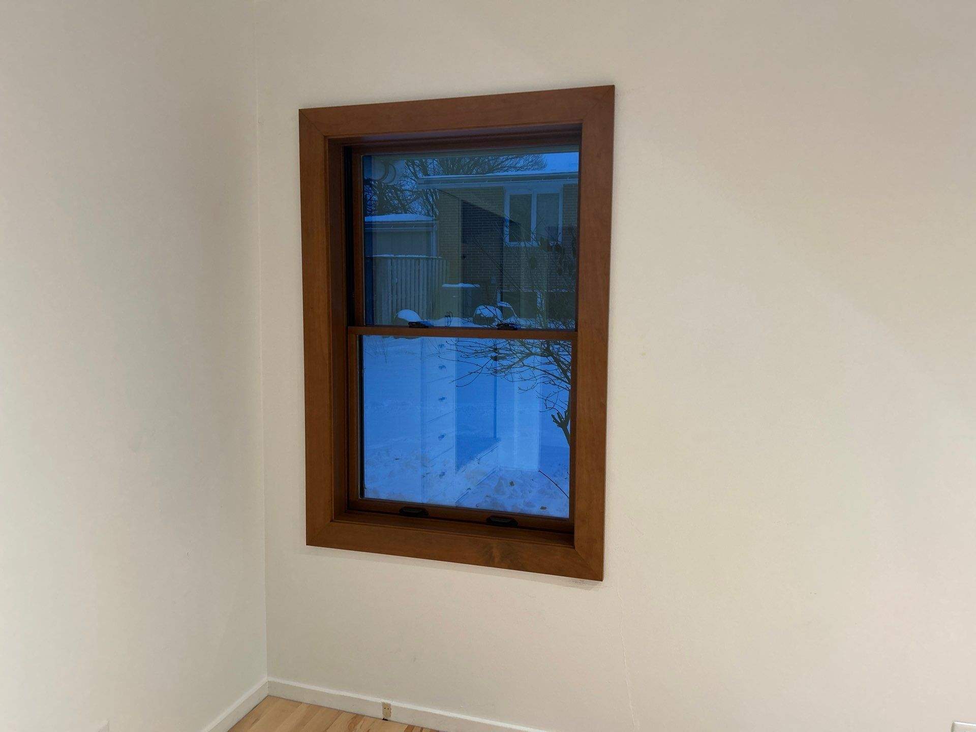 Black-Frame Pella Lifestyle Upgrade on a Partial Brick Home by United Windows and Siding LLC