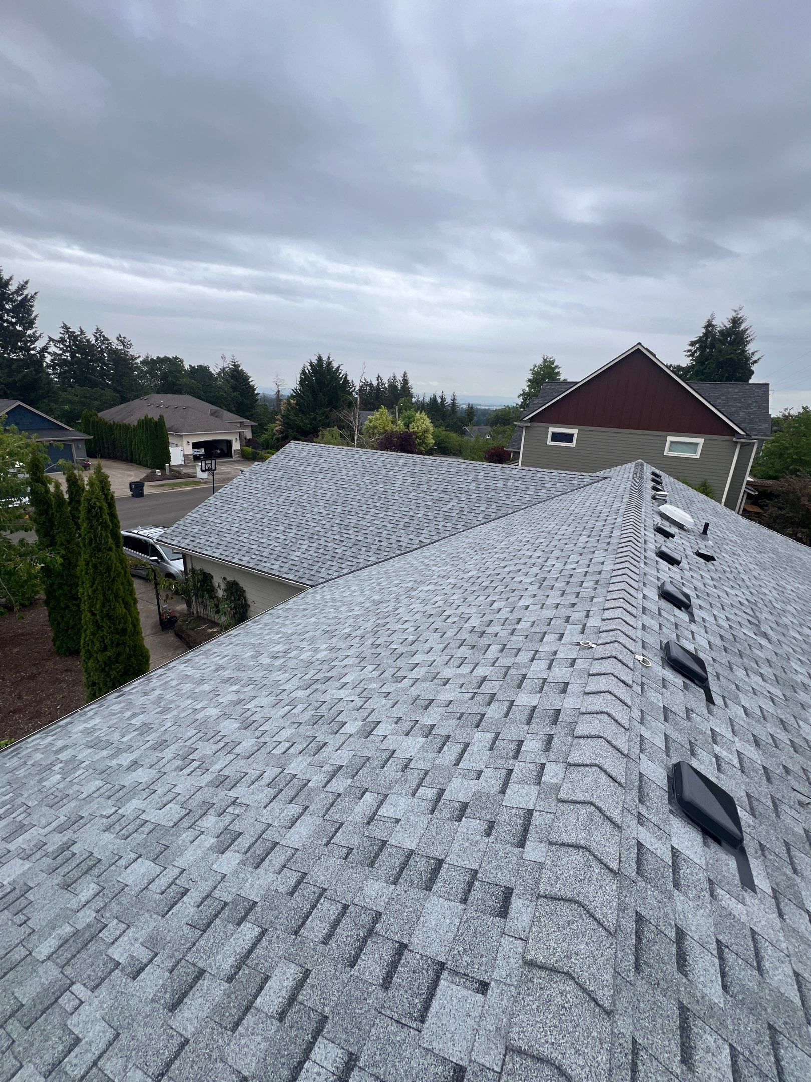 Residential Roofing Installation using IKO Cambridge (Color: Dual Grey) by Orezona Building & Roofing Company, Inc.