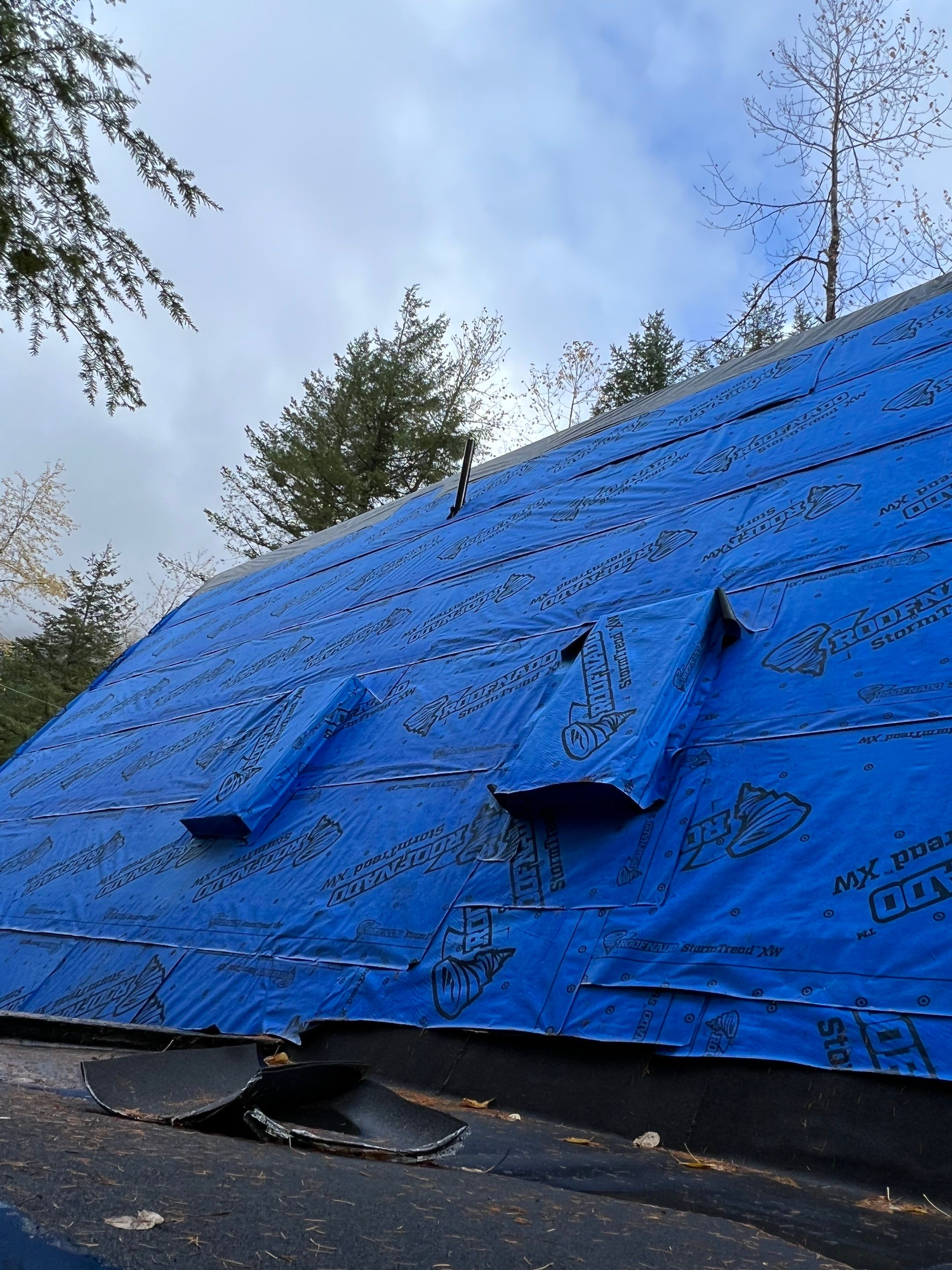Residential Roofing Installation using 12" Prolok metal  by Top Notch Roofing Inc