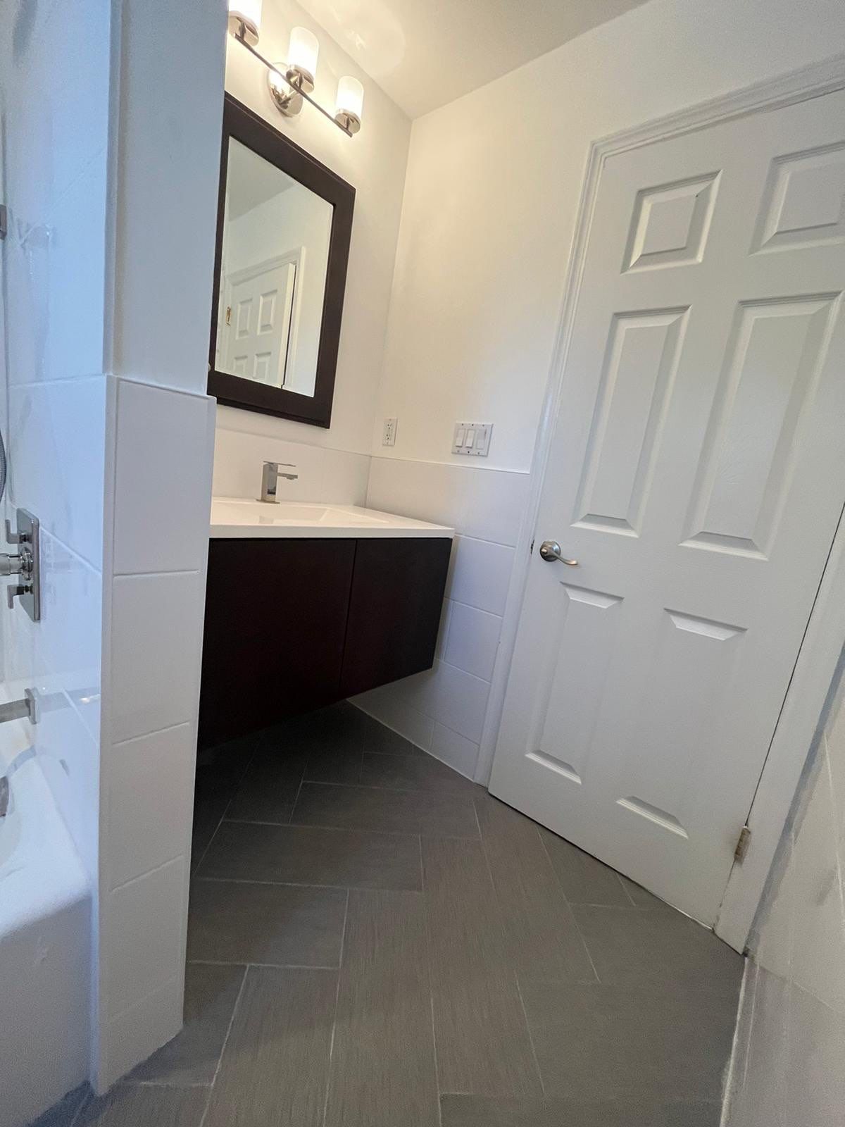 Bathroom Remodel using Tile by Home Concepts Construction