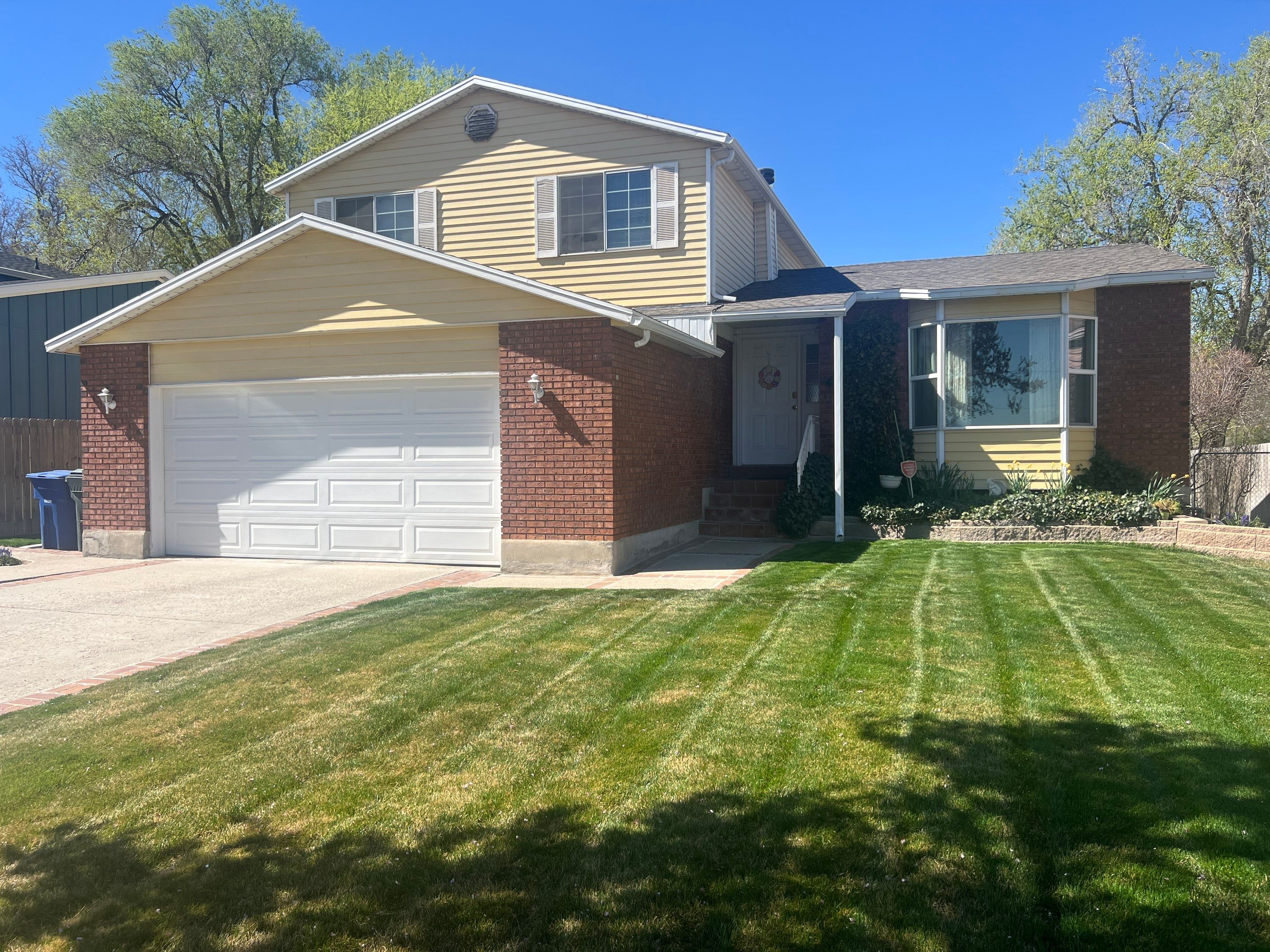 West Valley City | Aluminum to Hardie Conversion | Timber Bark & Arctic White by Ideal Siding Utah