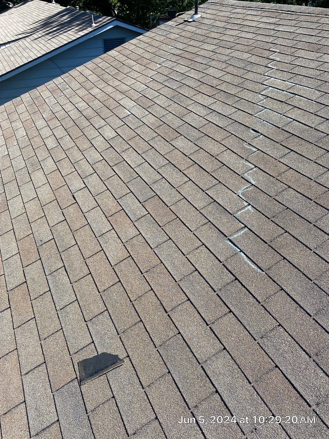 Roof inspection in Bartlesville by Decor Roofing & Restoration