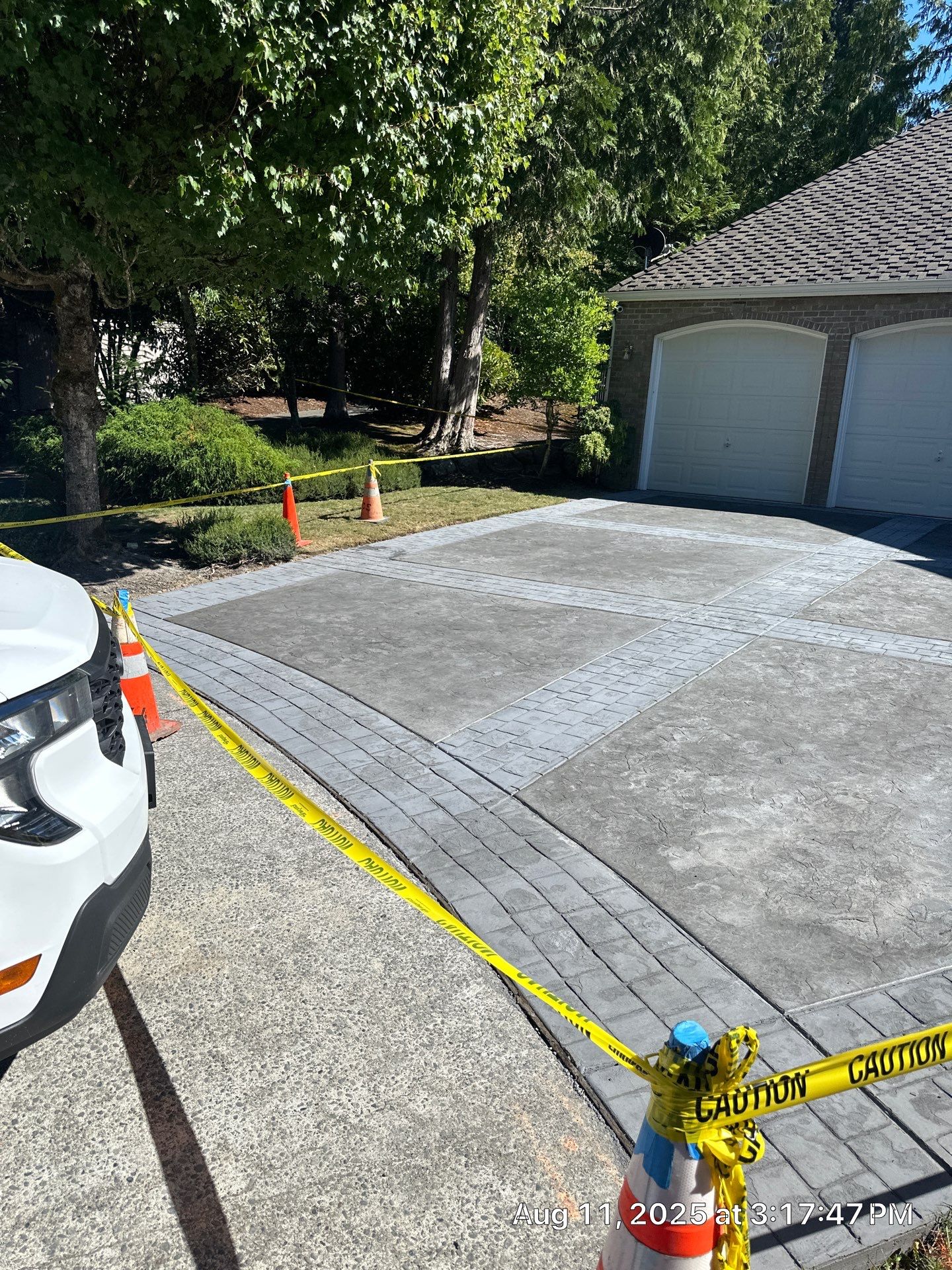 Multi-color Stamped & Sealed Concrete Driveway Renovation | Mukilteo by Jireh Asphalt & Concrete Inc