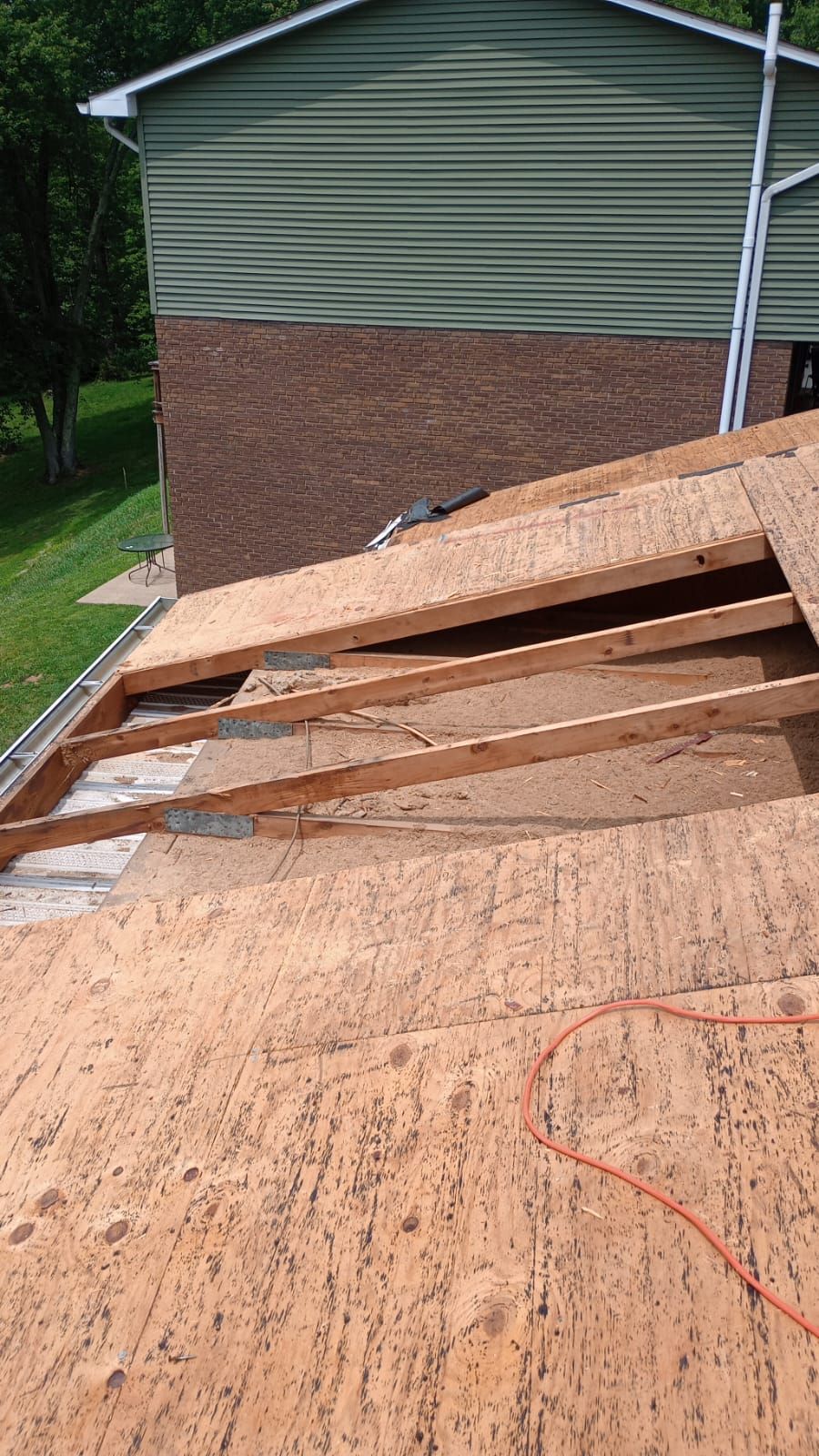 Residential Roofing Installation using GAF Timberline HDZ Charcoal by Rainstoppers Roofing