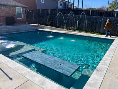 Modern Geometric Pool with Raised Spa