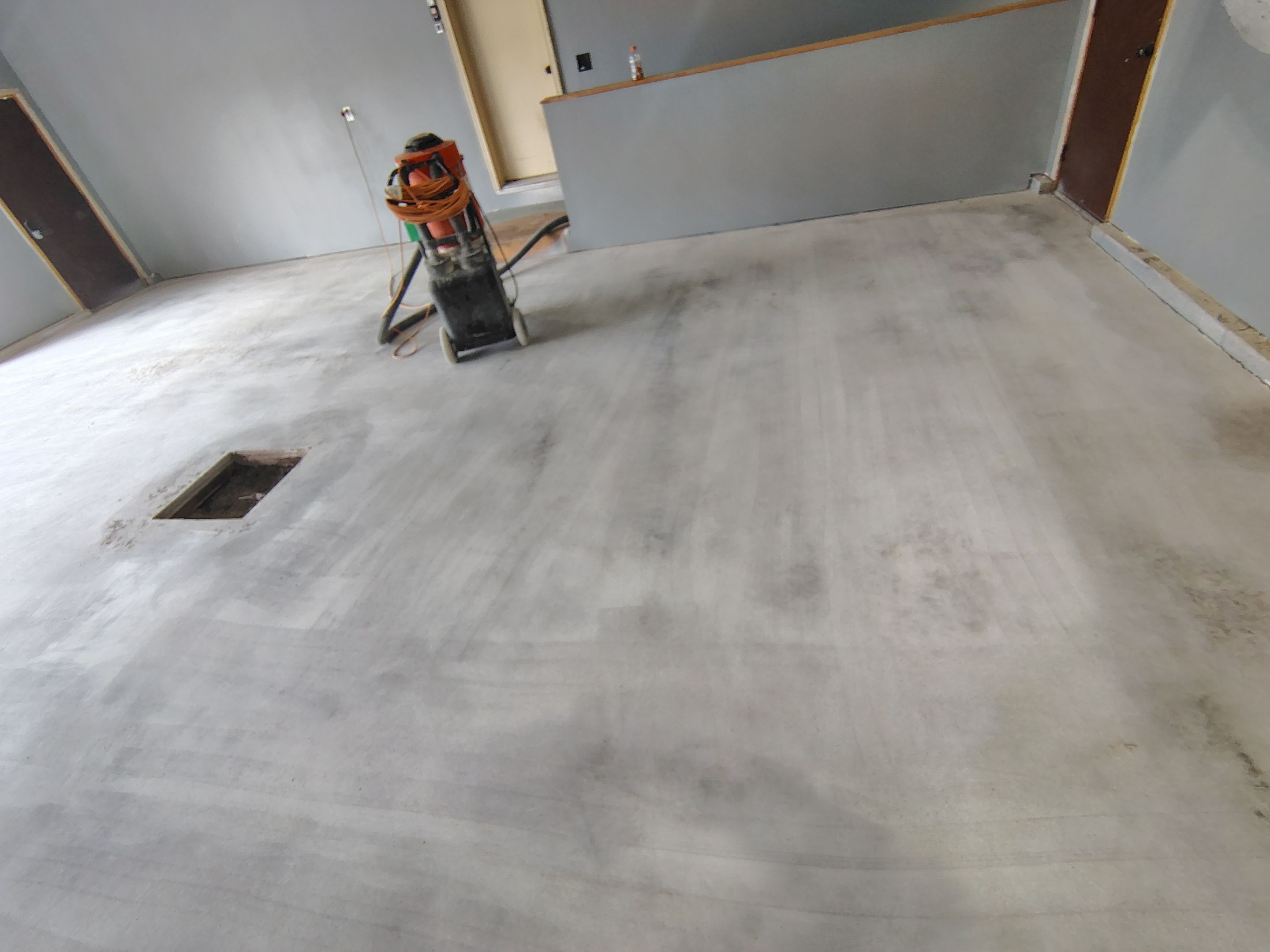 Garage Floor Concrete Coating and Surface Restoration in Colman by Select Painting, Coatings & Garage Cabinets