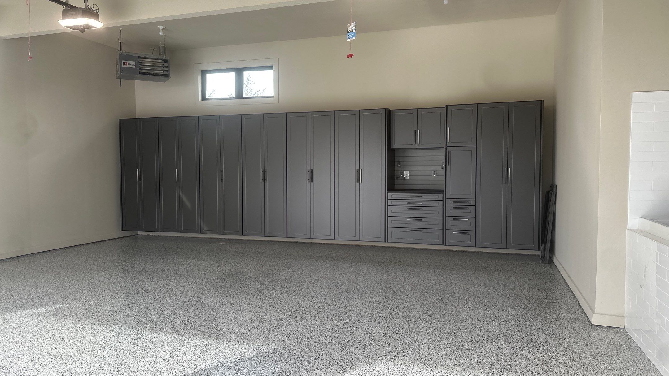 Tim S. added Cabinets and a Banner Garage Floor to his garage by Banner Garage
