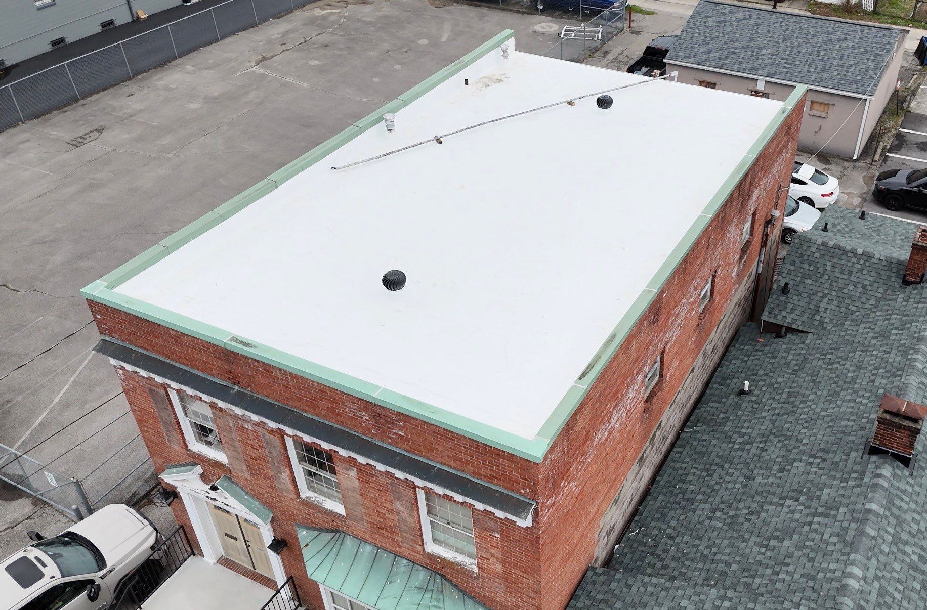 Flat Roof Replacement in Louisville, KY by GreenForce Restoration