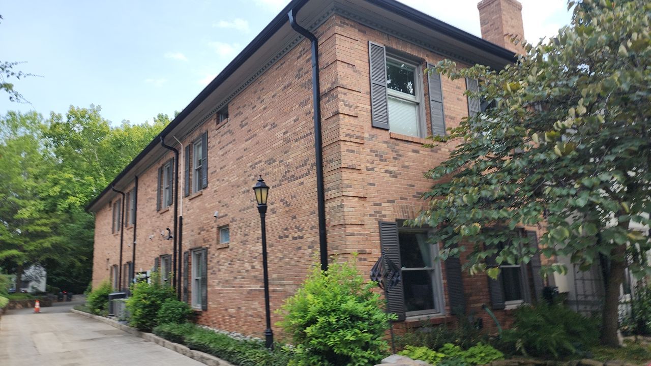 building clean using cleaner by Power Wash Masters LLC