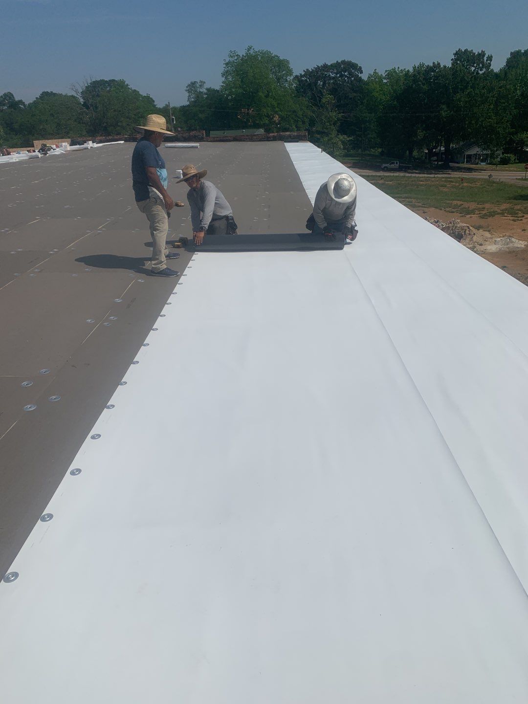 Commercial Roofing Installation using 50 mil PVC by Hostetler Roofing