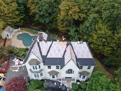 New Roof, Skylights, and Metal Accent Roof Installation in Groton
