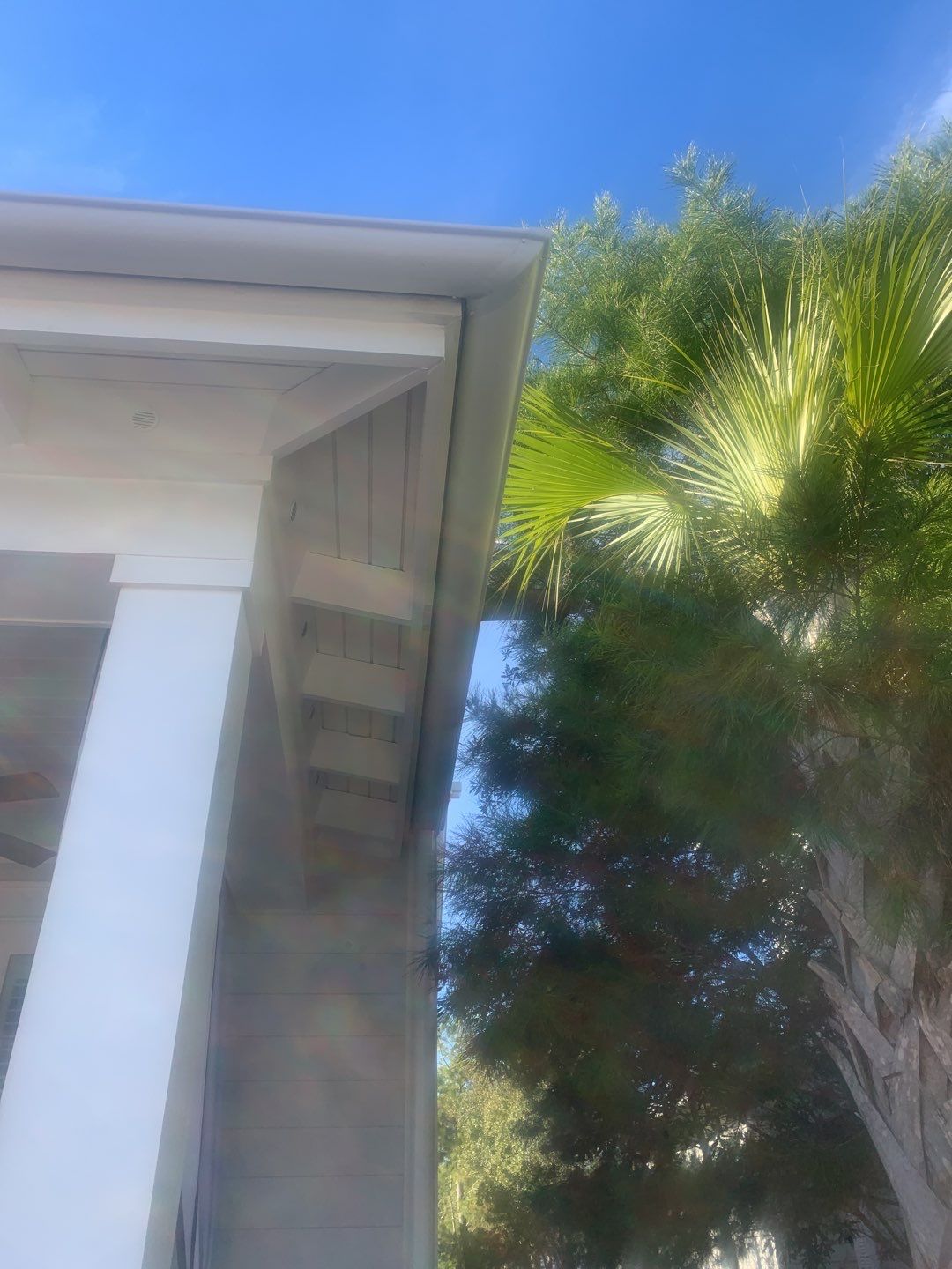 White Half-Round Gutters Installation in Rosemary Beach, FL by Gutter Professors