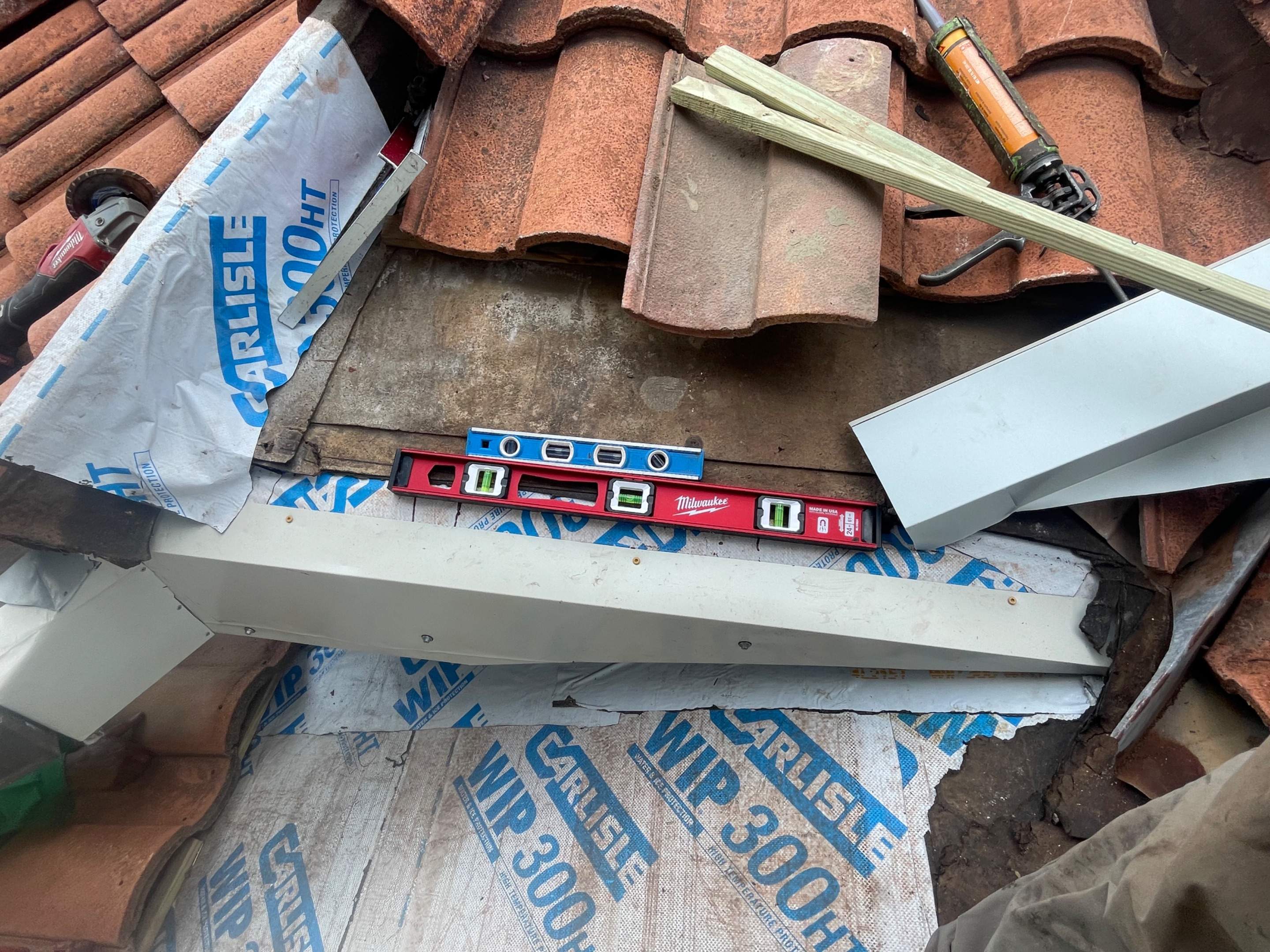 Dead Valley Repair on a Tile Roof  by Associates Roofing Unlimited 