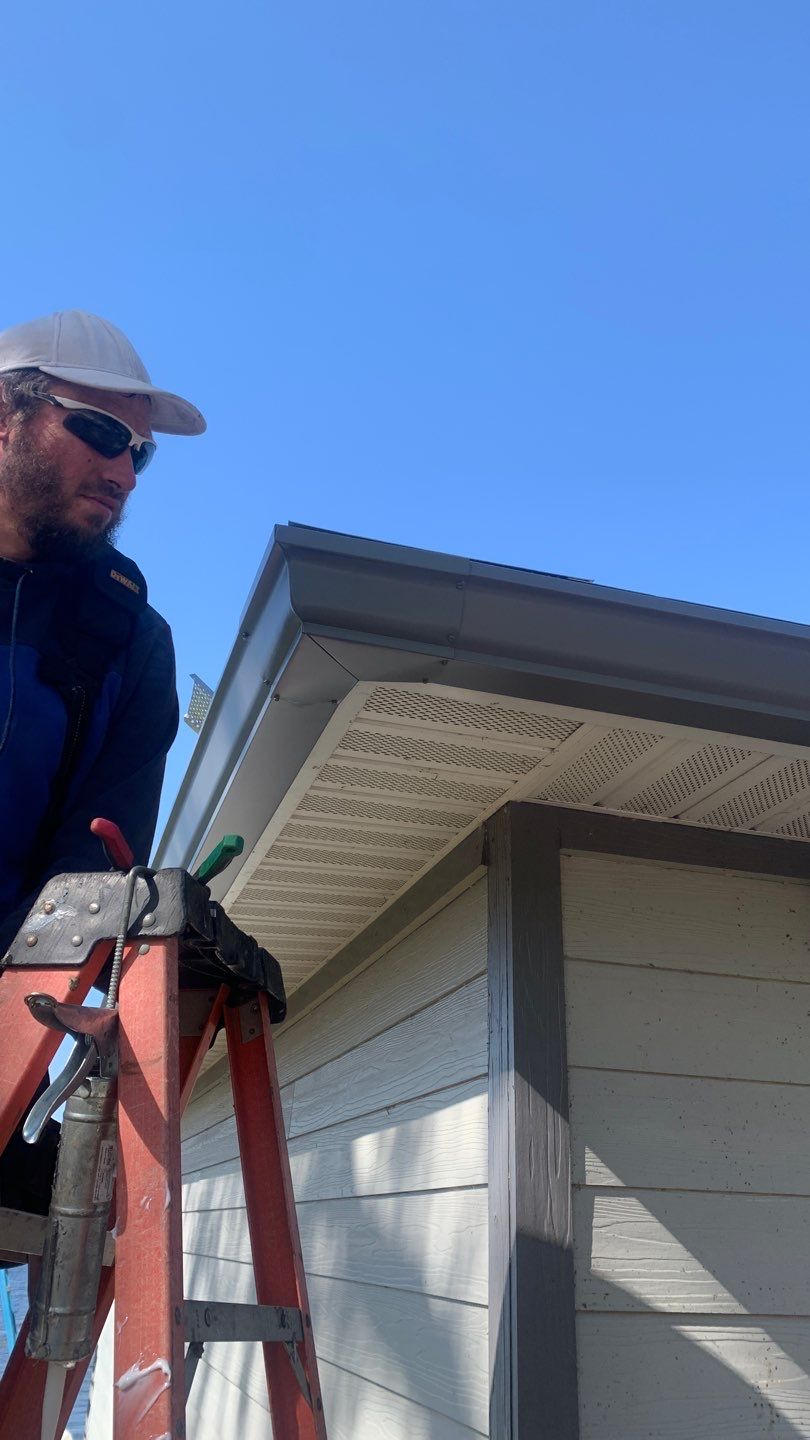 Gutter Installation Using Charcoal Grey K-Style Seamless Aluminum Gutters by Gutter Professors